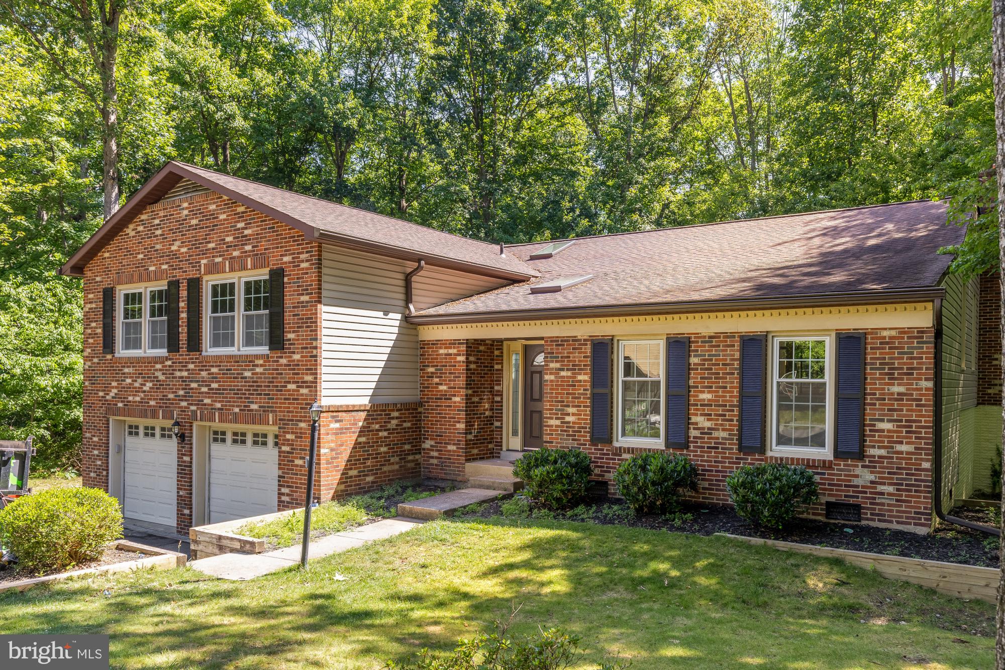 Tucked away on a quiet cul-de-sac in the highly sought after Lake Ridge community, this beautifully updated brick colonial inspired split level offers the perfect balance of space, privacy, and modern updates. Situated on nearly half an acre and surrounded by mature trees, this home provides a private retreat while remaining close to everything Woodbridge has to offer.

Offering approximately 3,300 square feet, the home features five bedrooms, three full bathrooms, and a functional layout ideal for both everyday living and entertaining. The recently renovated kitchen serves as the heart of the home with beautiful finishes and ample storage.

Enjoy a spacious back deck overlooking the expansive lot, perfect for entertaining or relaxing in a peaceful setting. Additional highlights include a two car garage, generous living spaces, and a versatile floor plan designed for comfort and flexibility.

Combining impressive size, thoughtful updates, and exceptional privacy, this home offers outstanding value in one of Woodbridge’s most desirable neighborhoods.