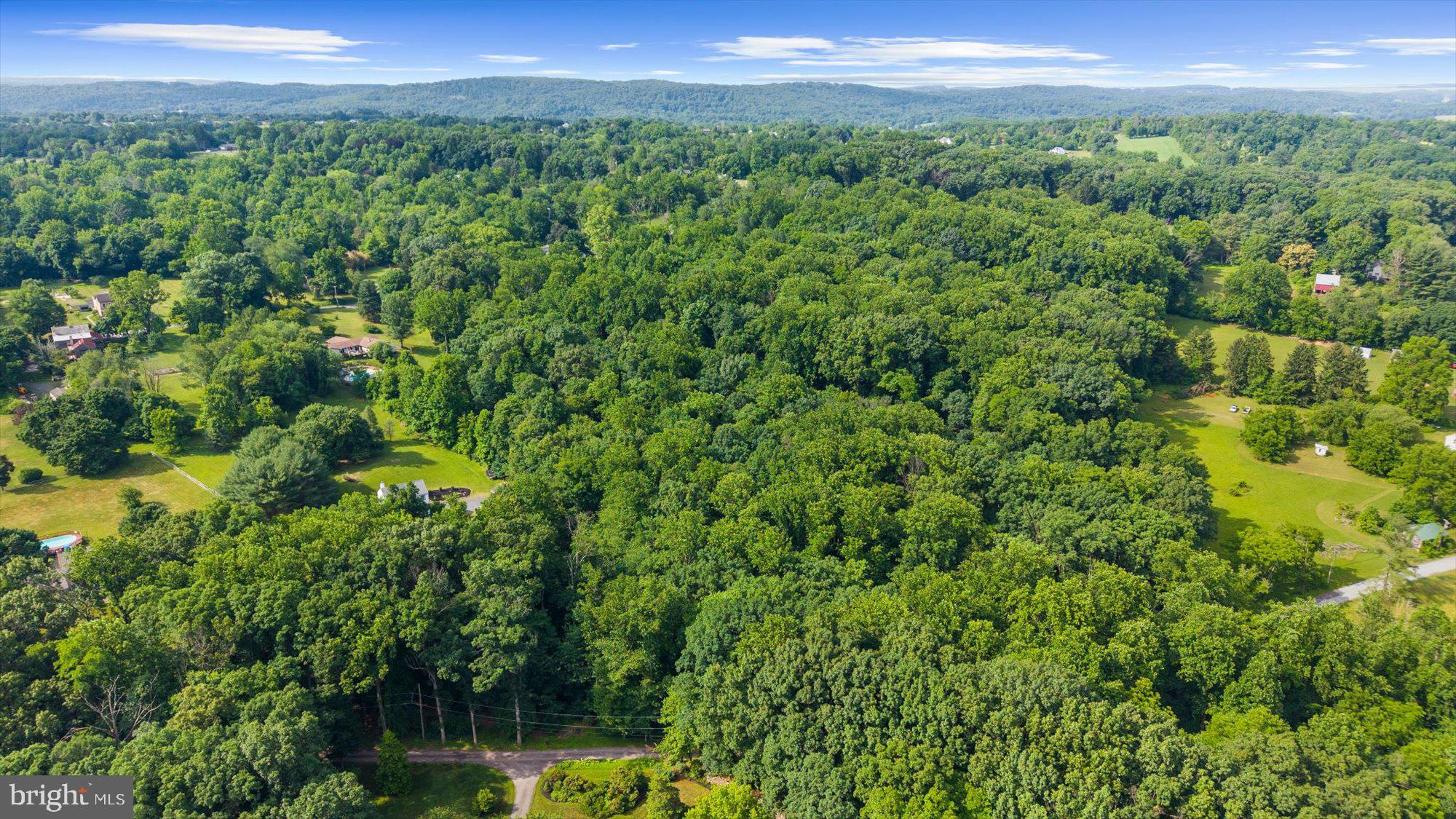 Here is your opportunity to create the home you’ve been dreaming of in a truly tranquil setting. Nestled on 2.2 acres of mature trees and natural beauty in East Coventry Township, this property offers the perfect blend of privacy, peace, and possibility. Imagine waking up surrounded by nature, designing a custom home that reflects your lifestyle, and enjoying your own private retreat while still being conveniently located near everything you need. Although this lot has an Ebelhare address, it is ONLY accessed through a private drive shared with 120 Bard Rd. Please do not walk the lot without an appointment.