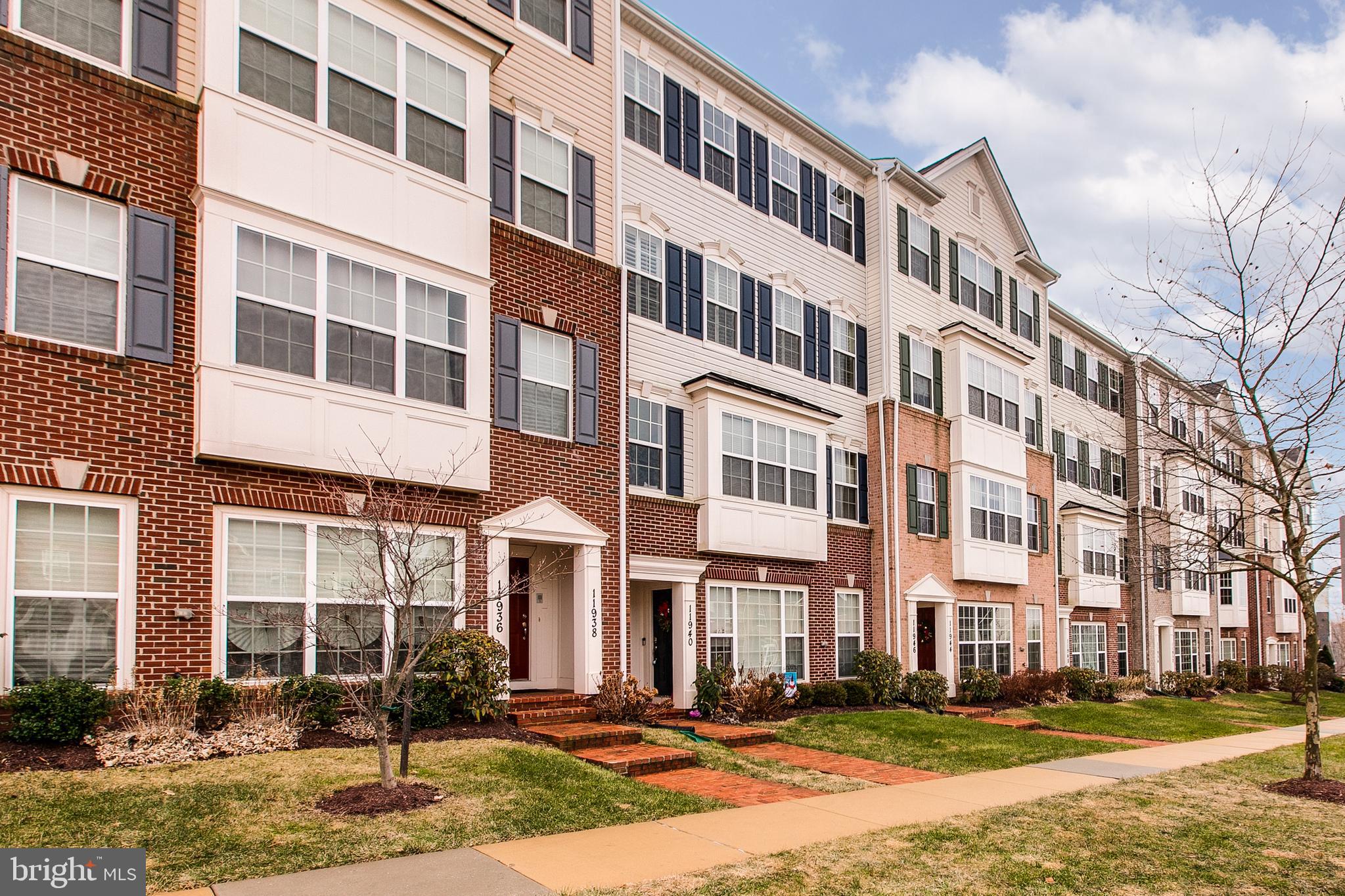 Very well maintained upper level condo in sought after Arora Hills community.  New carpet and fresh paint throughout the entire home.  Beautiful customized premium wood shutters are installed for all windows, which adds an upscale touch! Hardwood floor throughout sun-filled living room and dining room. And a study off-living room is perfect for a home office. Gourmet kitchen with granite counter top and tall cherry cabinet. Cozy family room features a gas fire place. 3 large bedrooms on the top level with washer and dryer on the same level.  Upgraded master bedroom has a separate shower and a large triangle tub. Enjoy the townhome living style without worrying about any exterior maintenance. One car garage is attached and access from rear. Lots of community amenities including several pools, playground, parks, trails plus more. Close to bus stop and only 5 minutes walk to community shopping areas anchored by Harris Teeter.  Overall a great home in a wonderful community!