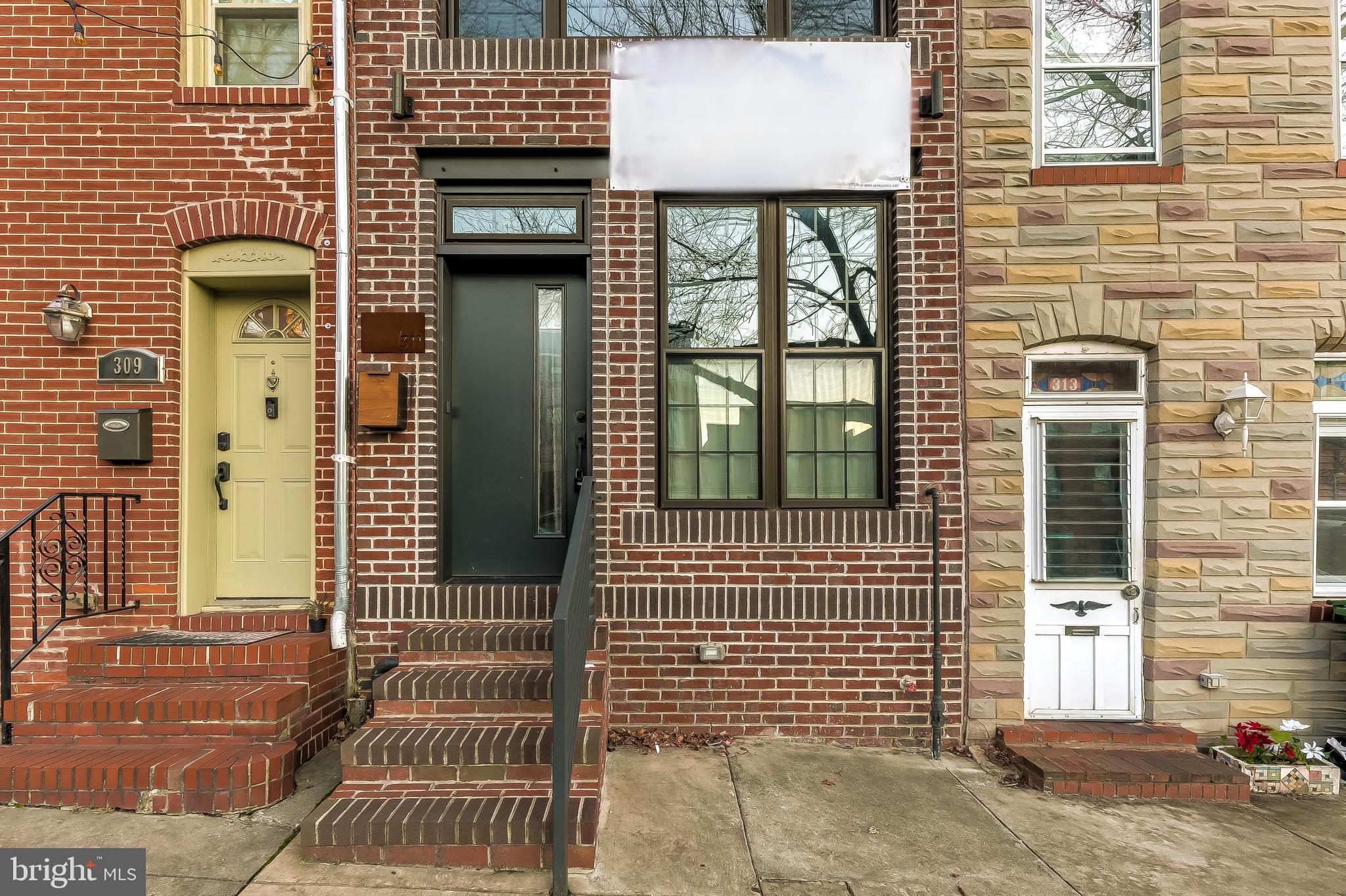 This home stands on the forefront when compared to others. The indoor second floor balcony gives the living room a two story ceiling height. There are three bedrooms with three full bathrooms on the upper levels of the home. One can enjoy  outdoor serenity on the roof deck or back patio.