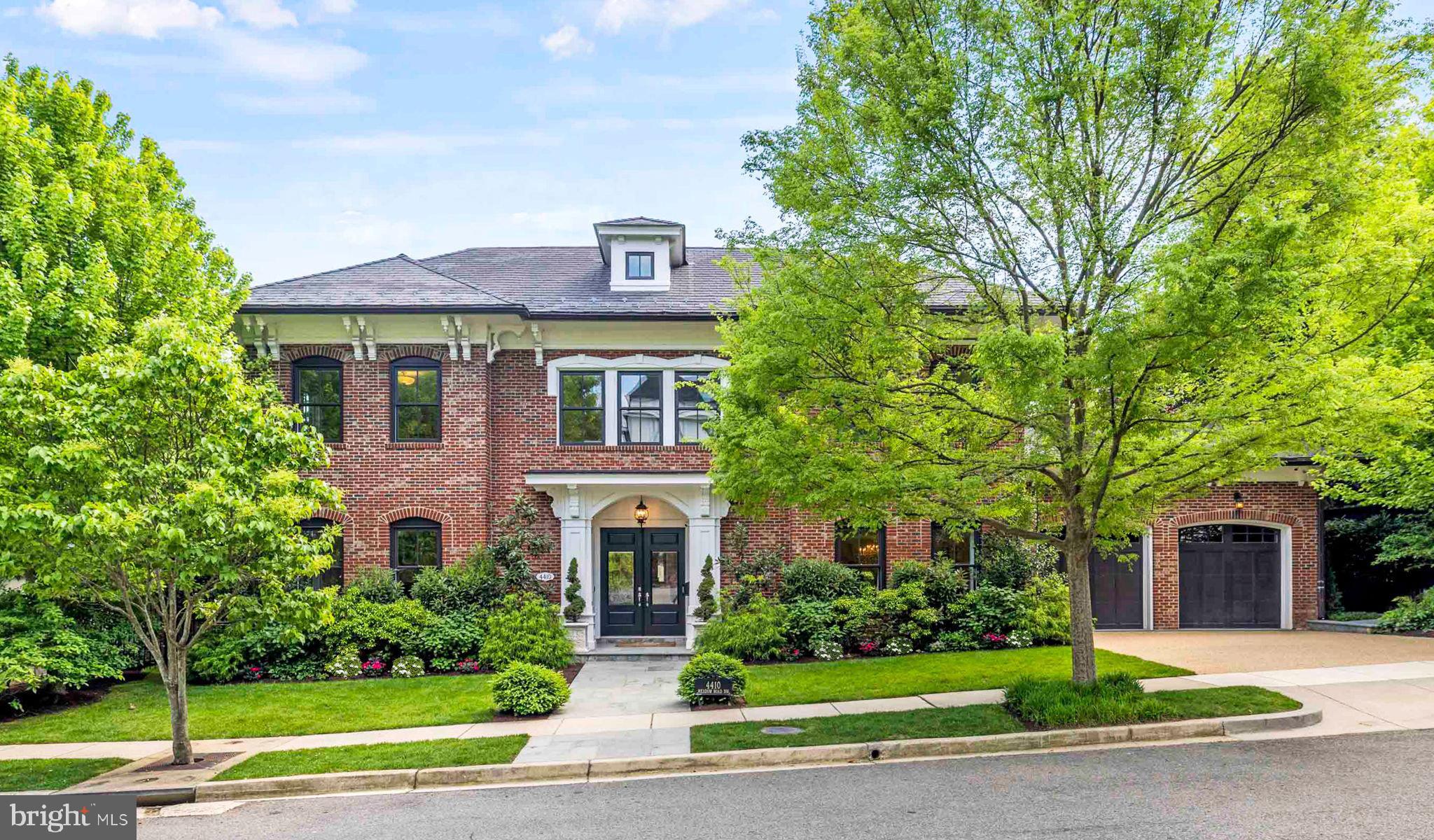 This extraordinary residence at 4410 Meadow in Berkley's exclusive Phillips Park community showcases the masterful collaboration of CIMA Design & Build and GTM Architects. Spanning approximately 7,300 finished sq ft, this home features soaring ceilings, abundant natural light, and premium finishes including White Oak hardwood floors and elegant millwork throughout. The main level impresses with 10ft ceilings, featuring a gourmet kitchen with marble countertops, Thermador appliances, and a spacious center island, flowing seamlessly to a sun-filled breakfast area and family room with coffered ceilings and a gas fireplace. The primary suite offers private vestibule entry, sitting area, balcony access, dual walk-in dressing rooms with custom cabinetry, and two spa-inspired marble bathrooms with heated floors. Three additional en-suite bedrooms, a family lounge, and two laundry rooms provide ample space for comfortable living. The lower level features a recreation room with a gas fireplace, game room, ballet/fitness studio, wine cellar, and fifth bedroom suite. Exterior highlights include Italianate architectural molding, multi-level slate and flagstone terraces, an outdoor kitchen, professional landscaping with a potential pool area, and state-of-the-art systems including geothermal heating/cooling and Sonos sound. Located in a secure, HOA-maintained neighborhood, this 9,268 total sq ft residence perfectly balances luxury and functionality for both grand entertaining and intimate family living.