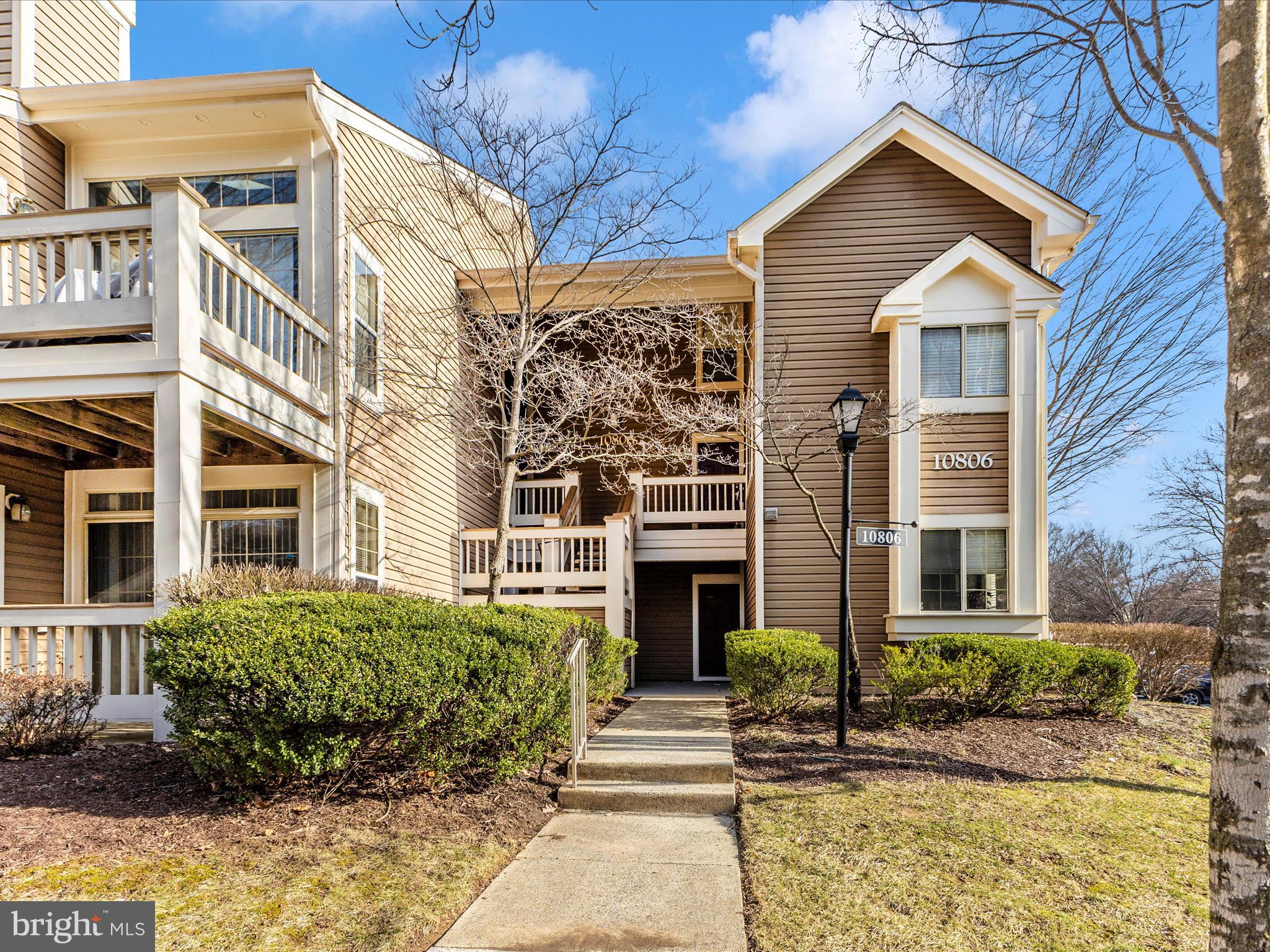 Beautifully maintained spacious 2 bedroom 2 full bath condo just a mile from Grosvenor-Strathmore Metro, near Trolley Trail, Pike and Rose, Montgomery Mall, Wildwood Center and more. Adjacent to 13.7 acre Timberlawn Park with playground, basketball courts, two soccer fields and picnic area.  Easy access to 495 & 270. Stunning open updated white kitchen with stainless steel appliances, granite countertops, glass tile backsplash, breakfast bar, electric stove, built in microwave, disposer, instant hot water dispenser, soap dispenser and pantry. Living room with a wood burning fireplace with mantle and glass doors. Newer  flooring, new sliding glass door leads to the private patio and storage closet. Primary bedroom with ceiling fan, 2 large closets with built ins. Updated primary bathroom with quartz countertops, separate shower and tub, heat lamp. Bedroom 2 with ceiling fan. Updated hall bath with quartz countertops, tub and heat lamp. W/D in unit. One assigned parking, ample unassigned. Beautiful community with 3 pools, 4 tennis courts and tot lot.