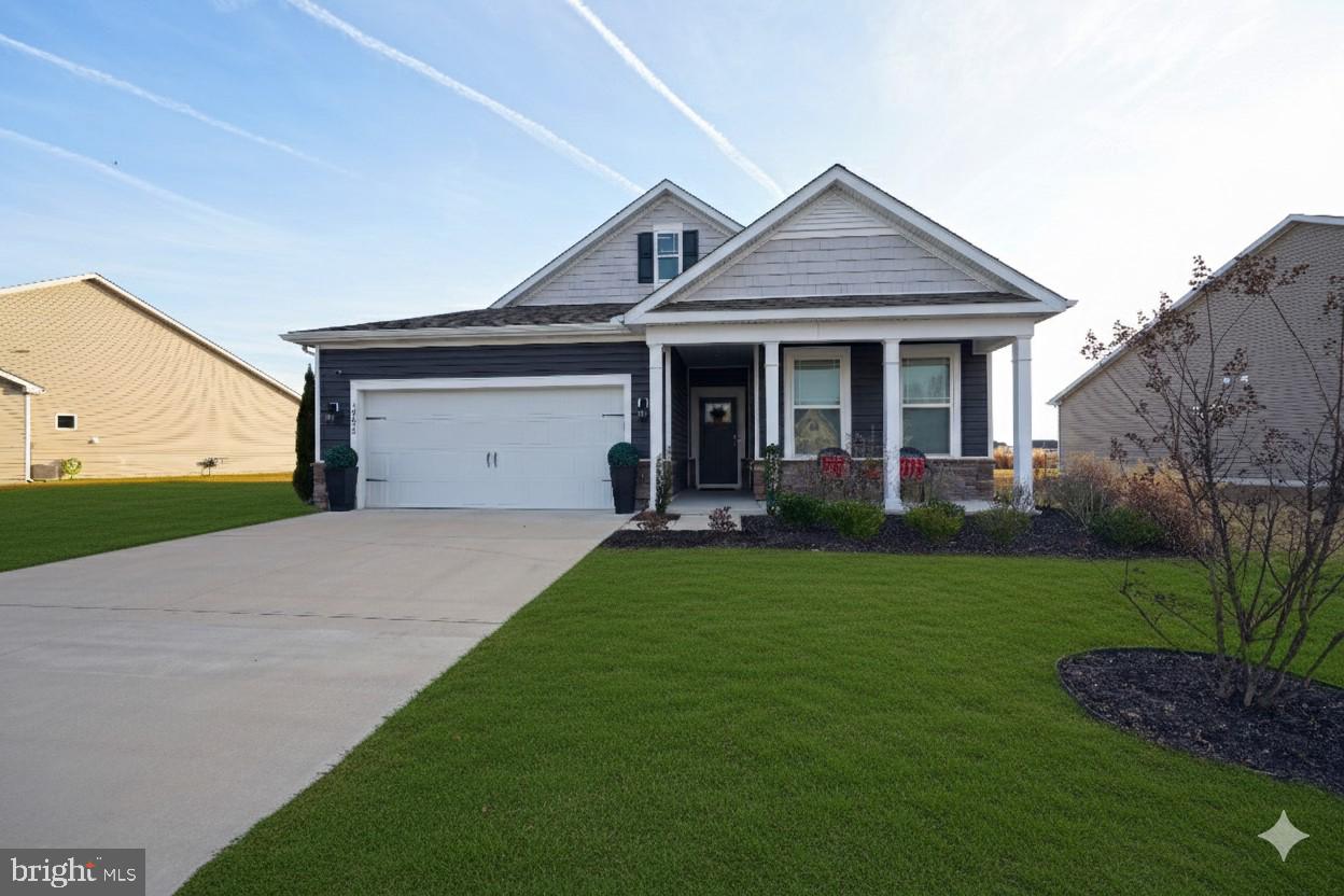 Move in ready and pristine condition. Pond front single floor rancher built in 2022 and  on a half acre lot.  
Offering a coastal design with a lot of natural sunlight. LVP flooring, carpeted bedrooms and window treatments. A large front porch with an easterly exposure and morning sunrise. The rear covered porch offers amazing evening sunsets overlooking the large community pond. Enter into the large foyer and the house opens into a large open floor plan.  White, bright and airy. The amazing gourmet kitchen features stainless steel appliances and a large center island. Perfect for entertaining with a large dining area and living room. The kitchen features 42” white cabinetry, glass tile backsplash, and granite countertops.  
The primary suite  features a spa like ensuite with a dual vanity,  stall shower, a private water closet, and a massive walk-in closet to accommodate any wardrobe. Two additional guest bedrooms share a well-appointed hall bath, a spacious laundry room, and interior garage access complete this home. Stonewater Creek offers  amenities that include an outdoor pool, tennis and pickleball courts, a playground, a clubhouse, and a fitness center.  Close proximity to Long Neck, In Town Millsboro, In Town Georgetown, In Town Lewes and the Boardwalk of Rehoboth Beach. Motivated seller makes this a must see property!