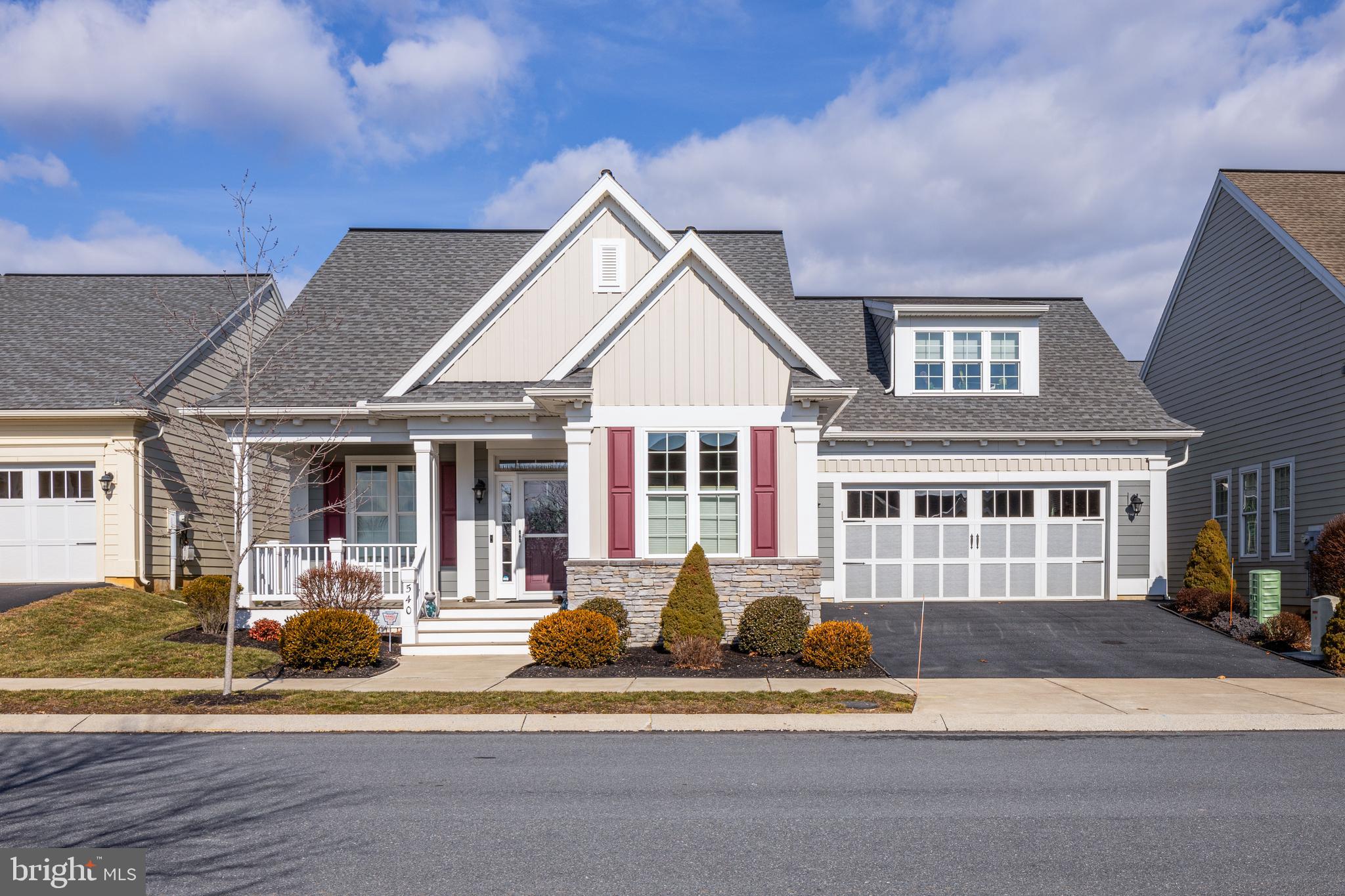 This exceptional 3-bedroom, 2.5-bath home in the sought-after 55+ community of Home Towne Square in Lancaster County offers high-end finishes, thoughtful design, and effortless living. Rich oak hardwood floors run throughout the main level, complemented by wide baseboards and beautifully crafted paneled doors. The open-concept layout is designed for both everyday comfort and entertaining, with a spacious kitchen at the heart of the home. A massive island provides plenty of seating, while the walk-in pantry keeps everything organized and within reach. The kitchen flows seamlessly into a bright living area, where a gas fireplace adds warmth and ambiance. A generous dining space leads directly into the sunroom—perfect for relaxing with coffee in the morning or unwinding in the evening. At the front of the home, a dedicated office with french doors offers a quiet retreat for reading, hobbies, or working from home. The main-level owner’s suite is designed for comfort, featuring a walk-in shower, double sink vanity, and a spacious walk-in closet. A second bedroom and full bath provide additional space for guests. Upstairs, a private suite with a large storage area ensures visitors have their own comfortable retreat. Every detail is designed to make life easier, from main-floor laundry and automatic lighting in most rooms to the two-car garage with a mudroom for added convenience. Outside, a welcoming front porch invites you to enjoy the neighborhood’s charming, village-style setting. Living at Home Towne Square means maintenance-free convenience with lawn care and snow removal included. Owners enjoy a vibrant community with a pool and patio, perfect for cooling off and socializing in the summer. The clubhouse offers an exercise room, multi-purpose space for parties, a meeting room for clubs, and a catering kitchen ideal for holiday gatherings. Relax by the fireside lounge, play billiards, or join neighbors at the outdoor gazebo and walking paths. With natural gas, public sewer, and public water, daily life is hassle-free.  This home puts you close to everything you need. Philadelphia, Baltimore, and New Jersey are quick and easy trips from Ephrata, with easy access to shopping, dining, and the rich culture of Pennsylvania Dutch Country. Local markets, live music, and community events provide endless opportunities to connect and enjoy the area year-round.