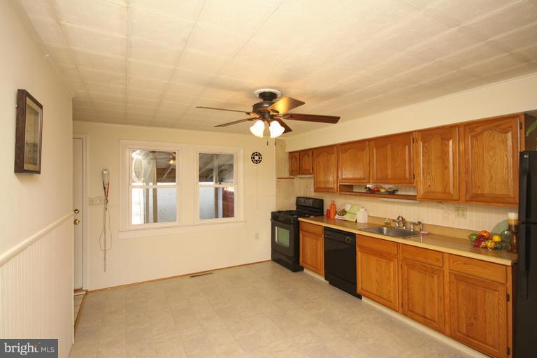 SPACIOUS 3 BEDROOM TOWN HOME WITH POSSIBLE 4TH IN FINISHED LOWER LEVEL WITH PLENTY OF STORAGE SPACE..UPDATED FULL BATH..OPEN KITCHEN WITH HUGE PANTRY CLOSET.PARKING IN REAR WITH SHED AND COVERED PATIO.FRESHLY PAINTED NEUTRAL COLORS...VERY WELL MAINTAIN GREAT CONDITION. CLOSE TO PARK AND SHOPPING CENTERS.READY FOR QUICK OCCUPANCY....APPLICATION ON MRIS DOCS..