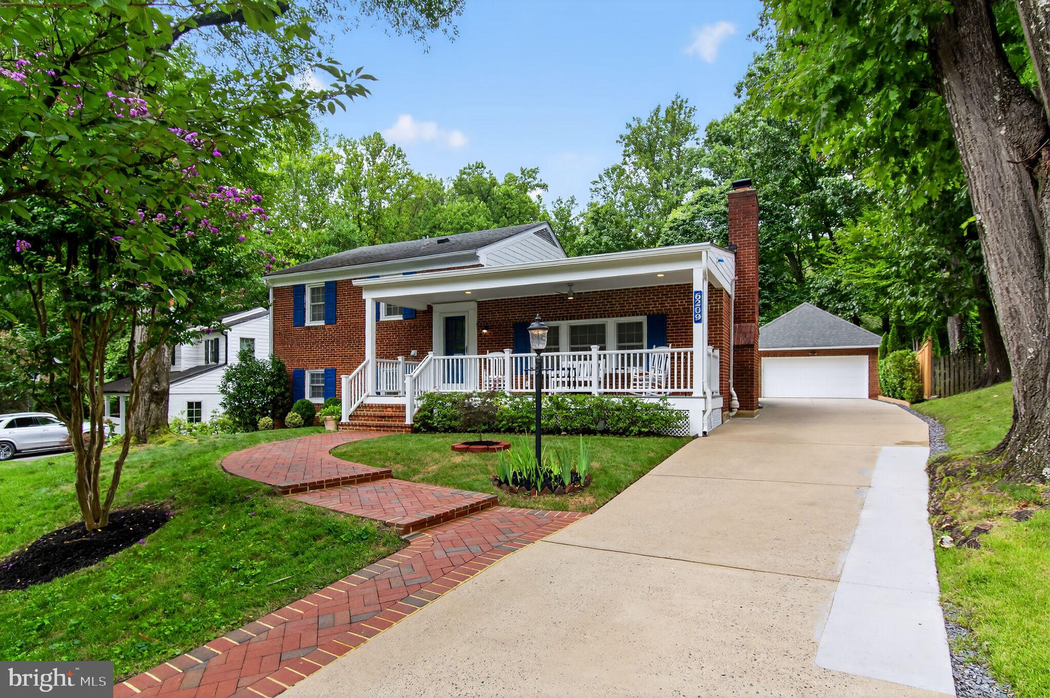 Open Sat and Sun 2-4

Discover this meticulously maintained 4-level brick split level in one of Bethesda's most coveted neighborhoods. Situated on a peaceful cul-de-sac on an expansive 16,000+ square foot lot, this home offers the perfect blend of thoughtful updates, prime location, and lifestyle convenience.

Whitman High School cluster - one of Maryland's top-rated school districts
Steps to Merrimac Park with walking paths, tennis and basketball courts, and playground
Minutes to downtown Bethesda, Capital Crescent Trail, and Westbard Square
Exceptional commuter access to DC, Virginia, and area airports

This home has been systematically enhanced with quality improvements:
Recent Major Renovations:
2024: Primary bathroom completely renovated, Sunsetter awning, new washer/dryer
2025: Bedroom-level hardwood floors professionally refinished
2020: Kitchen fully renovated with Alpine White custom cabinets, Caspian White Leather Finish granite, radiant porcelain floors, premium LG and KitchenAid appliances including double ovens, gas cooktop, wine cooler, and built-in pantry

Thompson Creek windows throughout (2020) with 50-year warranty
HVAC system replaced (2016), serviced bi-annually, with UV air purifier (2020)
200-amp electrical panel (2016)
50-gallon water heater (2018)
New chimney lining and flue
Radon mitigation system
Garage HVAC system (2020)

The sun-filled living room features a dramatic picture window overlooking professionally landscaped grounds, a gas fireplace, plus four remote-controlled skylights (two are venting) that flood the space with natural light. The spacious gourmet kitchen, perfect for entertaining includes both a breakfast area, center island, LG appliances and a Kitchen Aid dishwasher, double-ovens, gas cooktop, under-cabinet lighting, and walk-in pantry. The banquet-sized dining room with lighted build-in cabinetry is perfect for hosting large gatherings. Lower-level hardwood floors were installed in 2017, adding warmth throughout.

Enjoy the welcoming covered front porch with ceiling fan and automatic lighting, plus a detached 2-car garage with long driveway, water access, 220V EV charging station (2017), and climate control. Additional storage shed with electricity. Both house and garage feature spray foam insulation for energy efficiency.