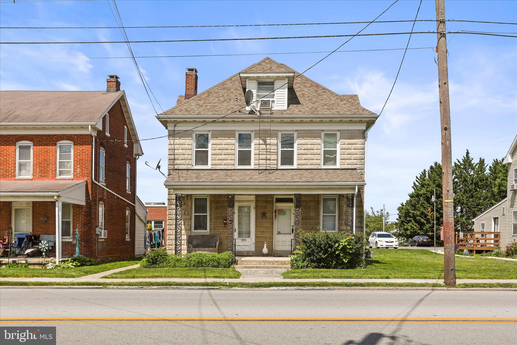 Great investment opportunity in the North End of the Hanover Borough! This solid 2-
unit property features a concrete block and brick facade. The home offers excellent income potential or
the option to live in one unit while renting the other. Unit 1 is located on the main level. It features one
bedroom, living room, a full bath, large eat in kitchen and walk-in pantry. Unit 2 spans the second and
third floors. It features three bedrooms, living room on the third floor, entrance mud room, a full bath,
kitchen/dining area and small office space or walk-in pantry. Both units have ample closet space plus
storage and laundry hookups in the basement. Tons of off-street parking adds extra convenience for
tenants and guests. Conveniently located close to shopping, restaurants, and everyday amenities with
easy access to commuter routes. Don’t miss this versatile investment property!