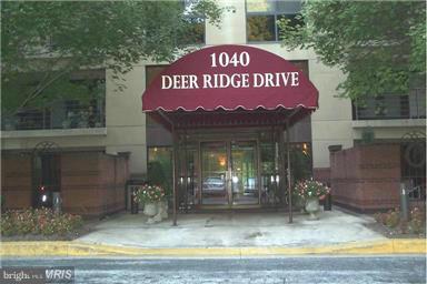 Spacious 3 BR/ 2 BA condo in conveniently located Roland Park community.  Neutral paint and carpeting, wood floors, bedrooms opening to covered balcony, separate laundry/utility room, bookcase in LR, ample closets, 2 garage parking spaces, secure building. Close to major highways, institutions, hospitals, Downtown, shopping, restaurants, etc.