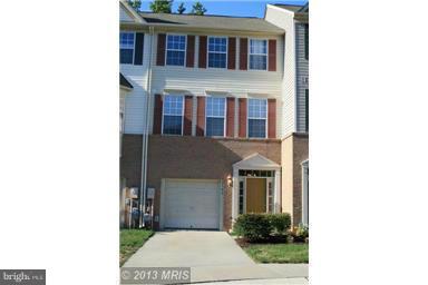 Dazzing, Move in ready, townhouse with garage in Piney Orchard. Backs to serene nature preserve. Freshly painted, HVAC system 6 months old. Designer touches include recessed lighting, skylights, updated master bath with heated tile, gourmet kitchen w/ stone counters, newer appliances, upgraded ceramic tile, hardwood and plush carpet. Gas fireplace, finished family room.