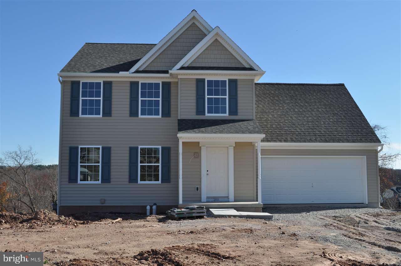 Carter Model      Home features Open floor plan, Living room, Dining area, Kitchen with island, finished lower level with 1/2 bath and a walk-out basement, 4 bedrooms, 2 full baths on second floor.