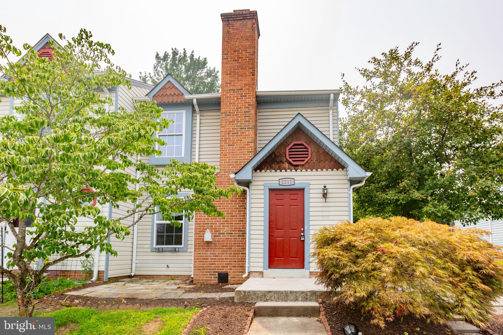 Welcome home to this beautifully updated end-unit townhome offering the perfect combination of modern upgrades, comfortable living spaces, and a convenient Fredericksburg location. Freshly painted throughout and featuring new carpet, updated LVP flooring, and stylish finishes, this move-in-ready home is ready for its next owner.

The main level welcomes you with a bright and inviting living room centered around a cozy wood-burning fireplace, creating the perfect space for relaxing evenings or entertaining guests. Sliding glass doors provide easy access to the newly fenced private backyard—ideal for outdoor dining, gardening, pets, or simply enjoying your own outdoor retreat.

The updated kitchen features new stainless steel appliances, a new sink, durable luxury vinyl plank flooring, and refreshed cabinets and finishes that offer both style and functionality. A conveniently located half bath with new toilet and light fixtures completes the main level.

Upstairs, the spacious primary suite includes a private en-suite bathroom, while a second generously sized bedroom also features its own full en-suite bath, providing comfort and privacy for family members or guests. Both bathrooms have been refreshed with new toilets and light fixtures to complement the home's cohesive, modern design.

Additional updates include fresh landscaping, fresh paint throughout, new carpet, new LVP flooring, and new appliances, making this home truly turnkey.

Ideally situated just minutes from I-95 and Route 1, you'll enjoy easy access to shopping, dining, and everyday conveniences including Lowe's, Target, Walmart Supercenter, Spotsylvania Regional Medical Center, and Spotsylvania County Parks. Whether you're searching for your next home or a strong investment opportunity, this updated end-unit townhome offers exceptional value in a prime location.