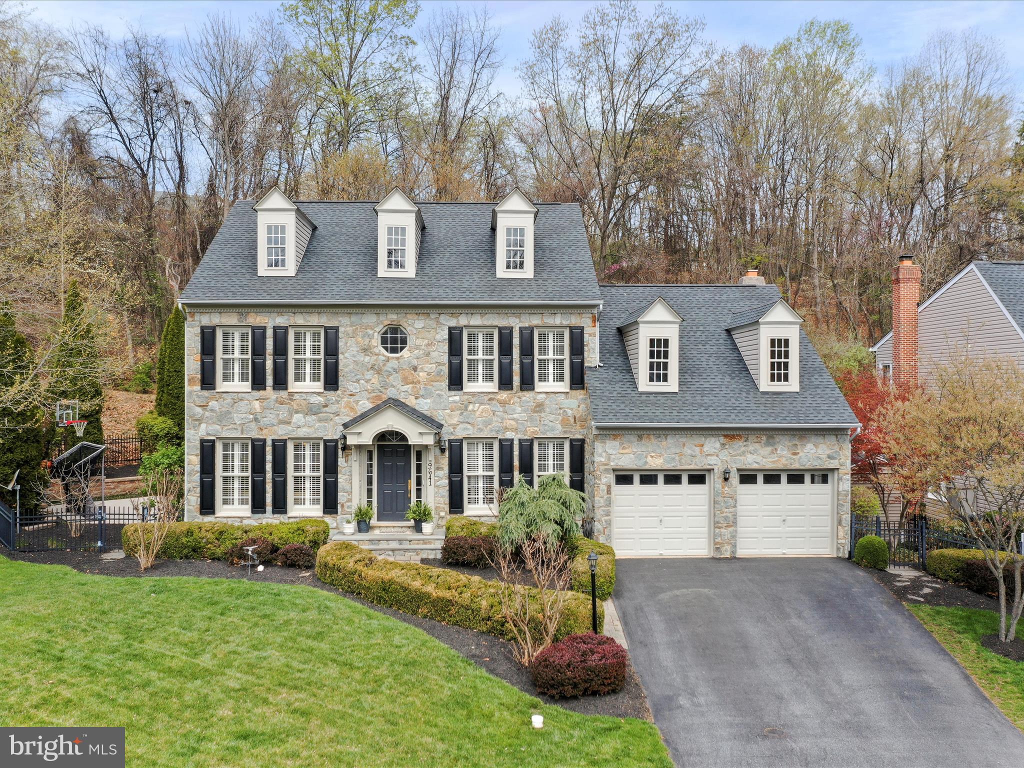 **​MULTIPLE OFFERS RECEIVED - SELLERS HAVE SET DEADLINE FOR HIGHEST AND BEST OFFERS DUE BY 5PM ON 4/28/25.  NOTE THE SELLERS COULD ELECT TO ACCEPT OFFER PRIOR TO DEADLINE SHOULD THE ELECT TO DO SO.**

Serene Luxury Meets Thoughtful Design at 9641 Woodland Road

Tucked away on a peaceful cul-de-sac in the sought-after Lake Linganore community, this exquisitely upgraded Craftmark home offers a rare blend of high-end craftsmanship, timeless elegance, and everyday comfort. With over 3,000 square feet of beautifully finished living space, 4 spacious bedrooms, 4.5 bathrooms, and countless custom touches, this is the kind of home you’ll never want to leave. Step into a chef’s dream kitchen—fully remodeled and ready for culinary adventures. Two oversized islands, double sinks, double dishwashers, and luxe marble and granite countertops make it both stunning and functional. Top-tier appliances and rich cabinetry set the stage for memorable meals and easy entertaining.
The spa-inspired primary suite is your personal retreat. The recently renovated bathroom boasts a Victoria + Albert clawfoot tub, triple shower heads, Restoration Hardware lighting, and elegant Kohler flooring and fixtures—every detail whispers luxury. A custom walk-in closet and plush new carpeting add to the indulgence. Soaring ceilings and beautiful oak flooring create an airy, welcoming vibe throughout, while crown molding and handcrafted finishes, including Potomac-sourced stonework, bring warmth and charm. A new HVAC system, newer roof, and tankless water heater offer modern peace of mind.
Outside, you’ll find your private backyard oasis: a 1,000 sq ft stone patio perfect for cozy fires, movie nights, or al fresco dinners under the stars. Lush mature landscaping surrounds you in privacy, and the basketball hoop adds a dash of fun for all ages. Additionally there is a spacious shed to store all of your landscaping  tools. Screened side panels on the double doors let fresh air flow through the home with ease.  The versatile floor plan includes a study with built-ins, a finished basement with 9’ ceilings and LVP flooring, a loft-level in-law suite, and a fully upgraded laundry room on the upper level for everyday convenience.  Located just steps from lake access, parks, trails, and a community playground and bus stop, this home is also part of the Lake Linganore Association—offering residents exclusive access to pools, trails, events, and more. Enjoy lake life with golf cart rides to farmers markets, Food Truck Tuesdays, and fireworks over the water.  Truly move-in ready with luxurious updates in every corner, 9641 Woodland Road is more than a home—it’s a lifestyle. Come see for yourself why this one is so special.