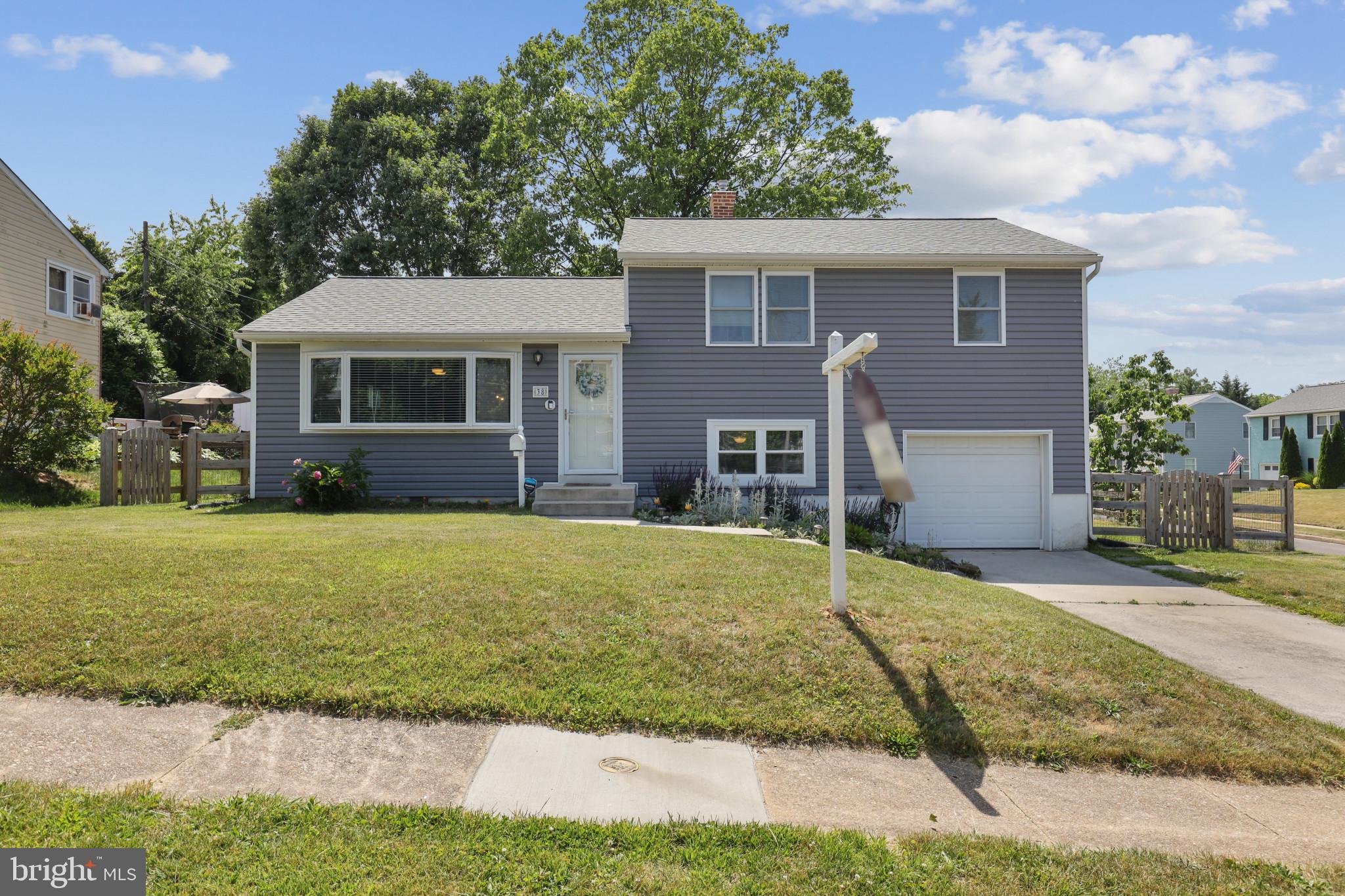 Beautiful updated and renovated split-level in the heart of Catonsville! Enjoy gorgeous hardwood floors, an open kitchen with high end granite countertops, a built in range, and stainless steel appliances on the main level. Second level features three oversized bedrooms, with a private walkout deck in the master, as well as a brand new renovated bathroom in 2023! The lower level features a large sunny family room, a half bath and utility laundry/area with newer washer and dryer(2019), HVAC (2020) and hot water heater(2018). Upgraded split-rail fence in 2020. In addition, new upgrades include new roof (2021), new sump pump (2021), new vapor barrier, insulation, and dehumidifier in crawl space (2021), four new windows (2022), repointed chimney (2022). HURRY - this one is a Catonsville classic gem and will not last!