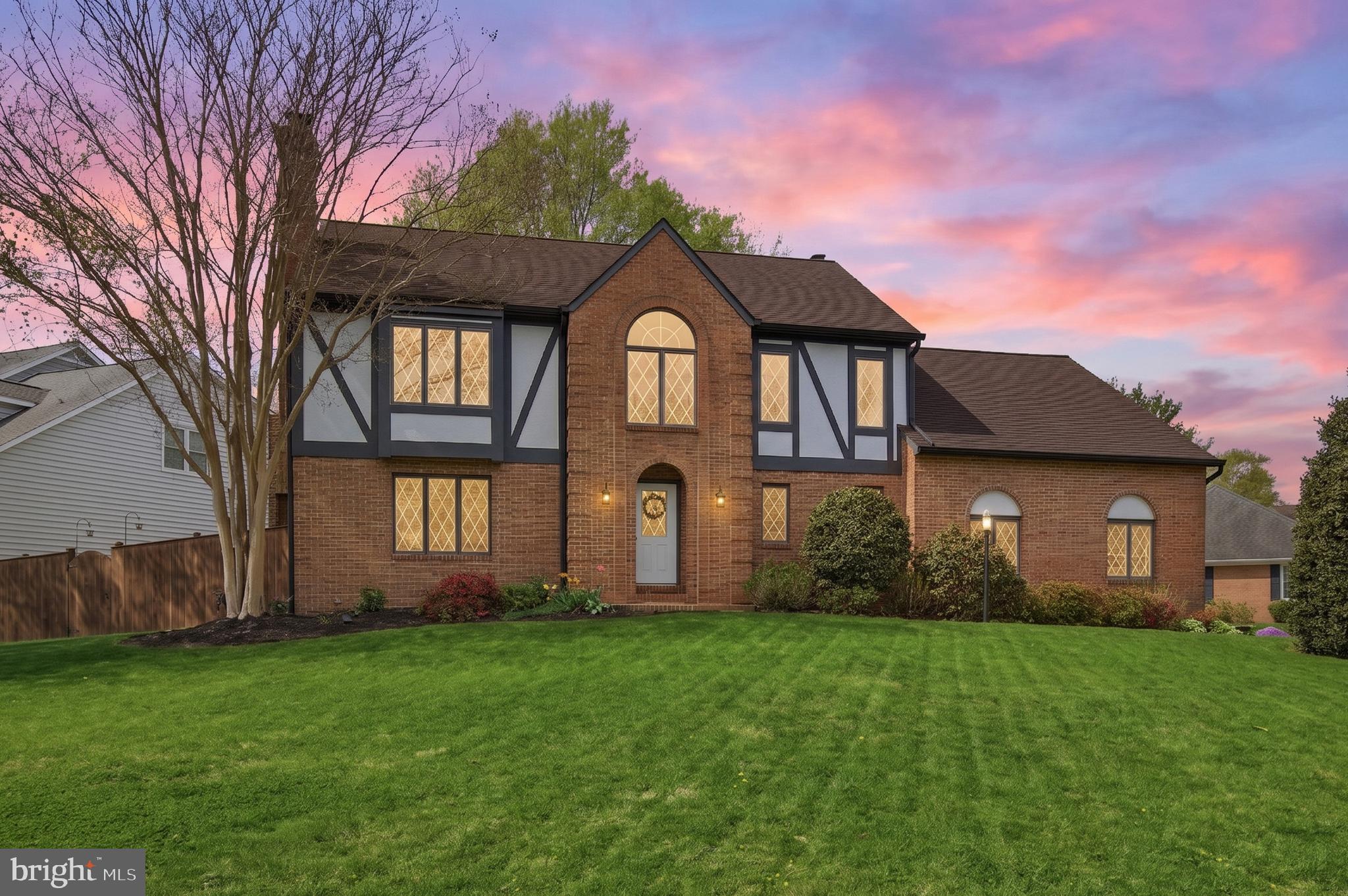 Steller single family home in the sought-after community of Crofton Orchard, inside the 'Crofton Triangle'. This custom built Tudor style home has had many fantastic updates in the last 5 years: New Hardie Board siding, high-end Stone Core LVP throughout main level, Trane HVAC 2021, Water Heater 2018, fully fenced in backyard 2020, Kitchen refresh 2023, Wallpaper removal, carpet removed throughout main levels and replaced with hard flooring, new paint throughout, Garage floor and walls refinished. Recessed lighting installed, and more. The inside is just as inviting as it is stately outside. These sellers have really perfected the balance between modernizing a home while maintaining the original style and intent. Main level has 2 large living room spaces and two options for dining rooms as well. There are (2) wood burning fireplaces that are serviced annually. There is also a mudroom/drop zone off the garage with the main-level laundry. White cabinets with granite countertops and newer appliances including an induction cooktop and double oven. Upstairs, you will find the large primary suite with room enough for an "Alaskan King" Bed (ask chatgpt), 2 walk in closets, and a huge bathroom with LARGE soaking tub, separate shower, 2 separate vanities & a water closet. There are 3 additional large bedrooms, one with a balcony, and a hall closet with double sinks and a water closet, for easy sharing. The basement is a huge space with a gym and large rec room, storage and powder room. Outside, you have 2 decks and a fully fenced, flat grassy yard with 3 gates, one being a double door gate. Crofton Woods/Middle/High Schools. Join Crofton Swim and Tennis or the Crofton Country Club. This is a winner!!