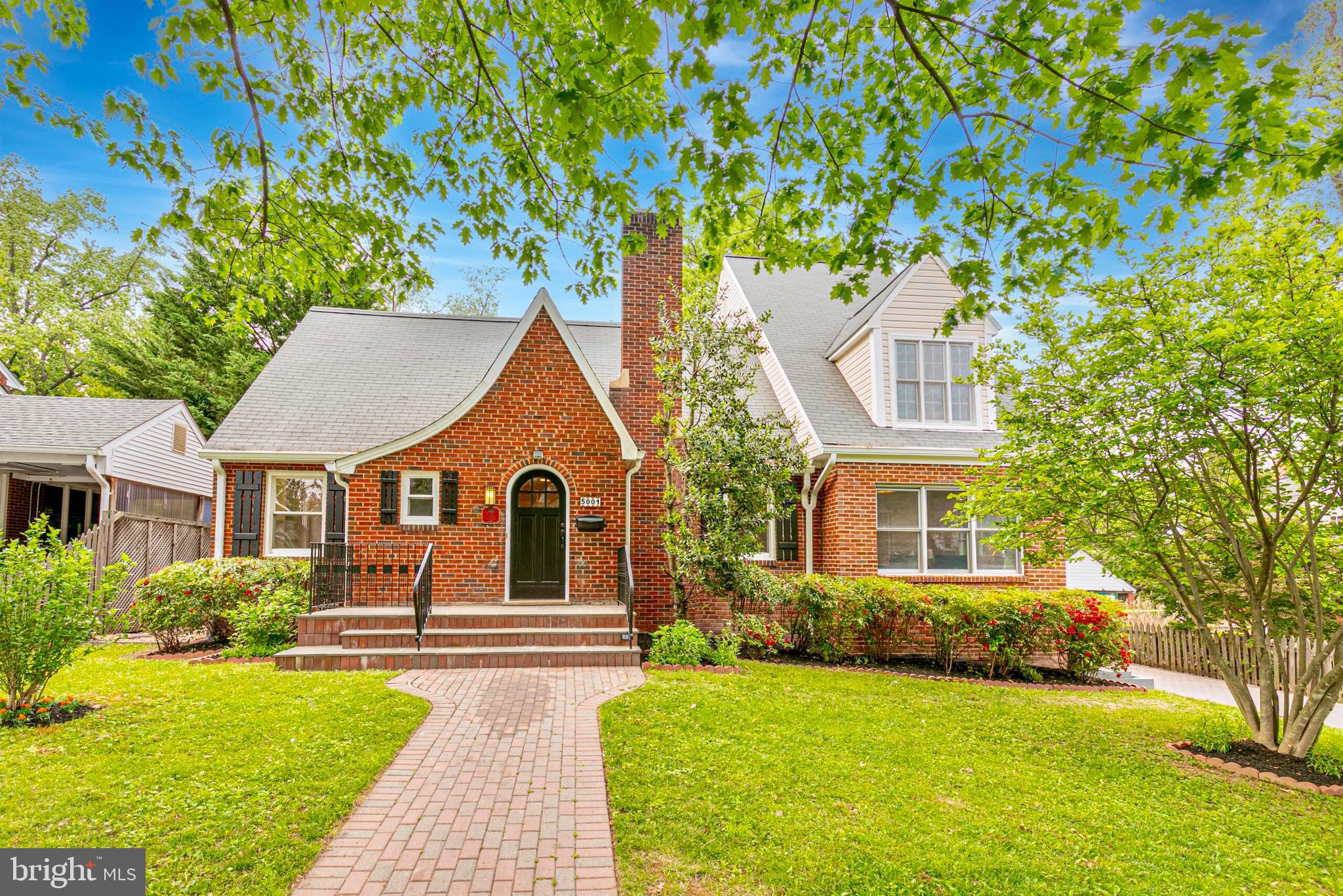 INCREDIBLE VALUE AND INSTANT EQUITY! Welcome home to 5001 14th St N—a beautifully updated and expanded 5700+ square foot home located in the sought-after Waycroft-Woodlawn neighborhood of Arlington. Blending timeless architecture with modern sophistication, this expansive home offers exceptional space, comfort, and versatility. 
The main level of this home features a large gallery space, 2 connected living rooms, a dining room, office, and main-level bedroom + full bathroom. The back extension of the home hosts the chef’s kitchen complete with an entertainer’s island, a new gas range and hood, dual viking refrigerators, and a separate pantry. There is also a breakfast room that opens up to the large sun-drenched 2-story family room. The entire backside of the home has access to the deck and patio, making this the perfect space for entertaining. 
The upper-level has a primary bedroom with a separate office/sitting room, an en-suite complete with dual vanities, a shower, soaking tub, and a walk-in closet! The second bedroom on this level can also be used as a second primary suite—as it has a sitting room and a large walk-in closet. There is also a 3rd bedroom with built-in cabinetry and a hall dual-vanity bathroom. 
The lower level features a large rec room, a bedroom, den, a gym, and ample storage that can easily be converted to a wine cellar. There is also a laundry room and access to the back patio.
Ideally located on a quiet street, sitting on a flat .19 acre lot, with a long paver driveway, and a detached 1-car garage. This home sits just a few houses down from Woodlawn Park, .3 miles from Virginia Hospital Center, .3 miles to the Custis Bike trail, 1 mile from the Ballston metro/shops/restaurants, 1 mile from the Westover Shops, and just minutes from Washington DC!! Feeding into top tier schools- including a short walk to Glebe Elementary and Washington-Liberty High School!