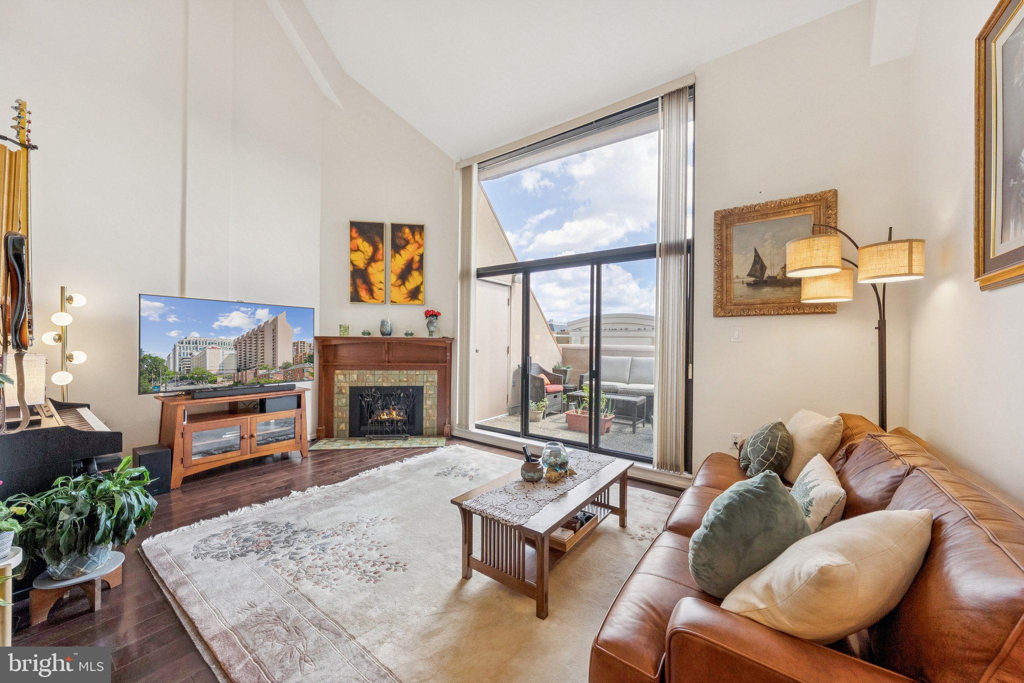 Welcome to this stunning 18th-floor 2 level PENTHOUSE condo in the sought-after Woodbury Heights building, offering breathtaking views of Arlington and beyond. This spacious 1 bedroom, 1.5 bath unit is filled with natural light from floor-to-ceiling windows along with a 2nd floor skylight, and boasts an open layout perfect for modern living.
The updated kitchen features granite countertops, black appliances, and ample cabinet space. The generous living and dining areas flow seamlessly to a private balcony, where you can enjoy sweeping skyline views. The bedroom provides plenty of space and includes ample closet space, while the bathroom has been tastefully updated. The 2nd floor loft is perfect for an office or den and includes a convenient wet bar. Garage parking (P#71 on level P3) and private storage unit conveys! HVAC (2024).
Residents of Woodbury Heights enjoy top-notch amenities, including a 24-hour concierge, outdoor pool, fitness center, and secure garage parking. Situated in the heart of Courthouse, you’re just steps from the Metro, dining, shopping, and everything Arlington has to offer—with quick access to Washington, DC.
This is the perfect opportunity for convenient urban living in a highly desirable location!