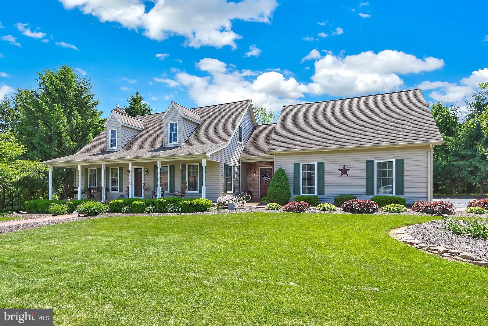 This amazing Cape Cod boasts an oversize 5 car garage w/water, electric and second story storage.  There is also a large Master Bedroom on the first floor (possible in-law quarters) that has it's own separate heating and central air units, a spacious country kitchen/dining room w/kitchen island and custom cabinetry,  a cozy family room with a brick fireplace, an inviting three seasons room and a 1st floor laundry.  The second floor consists of three nice size bedrooms, a full bath and loads of storage.  The large walk in closet in the larger bedroom is ready to be converted into a bath room which would make this another Master Bedroom.  Basement has two game rooms and a family room, and again, lots of storage.  Exterior has a very nice patio and an in ground pool for you summer pleasure.  Nicely landscaped yard with a unique carving.  Home also comes with a 1 year home warranty.  Much more.  A great home for year round entertaining.  Must see to believe.