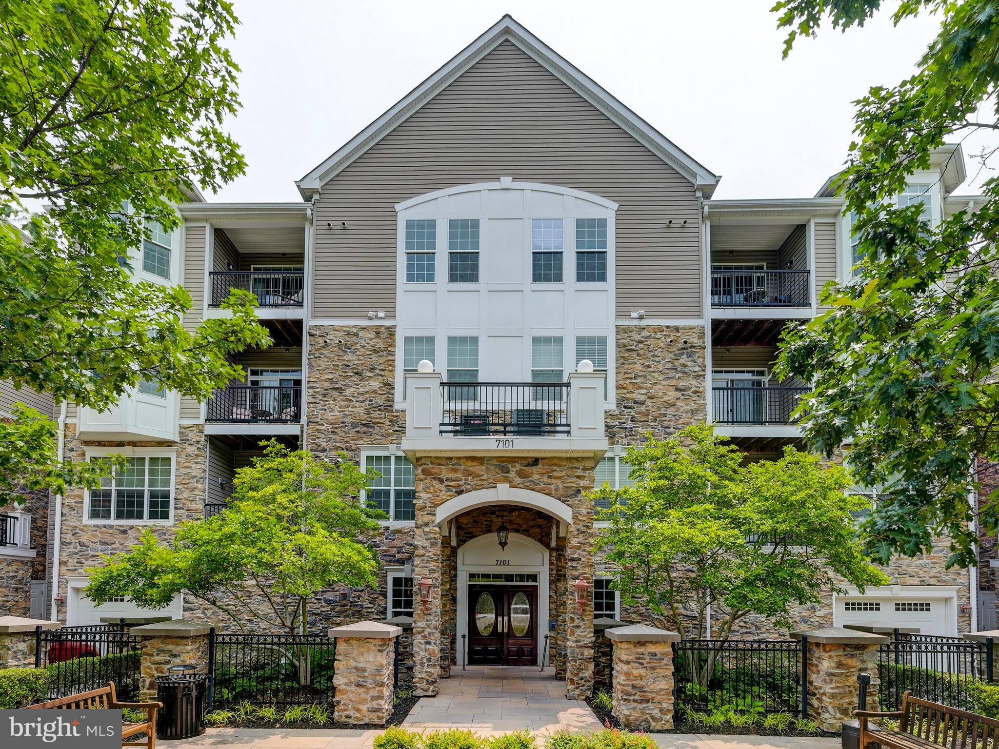 Rarely available! Welcome to this beautifully maintained 2 Bedroom, 2 bath condo with an ATTACHED GARAGE & storage closet (#9) included. This spacious residence features a den or study with custom built-ins off the foyer, an eat-in kitchen with all appliances, crown moldings in the LR & DR & a thoughtfully designed layout perfect for everyday living  & entertaining. The primary bedroom features a sitting area with custom built-in desks, walk-in closet with organizers, ceiling fan & private bath with tiled shower. The full size washer & dryer is conveniently located in this unit. Enjoy peaceful mornings or relaxing evenings on your private balcony overlooking the rear serene park-like grounds. The 2nd bedroom includes a walk-in closet with organizers plus additional closet. Located in a gated community residents enjoy exceptional community amenities including access to a wonderful clubhouse with a fitness center, tennis courts plus a community pool creating a resort-style lifestyle right at home! Storage closet is located on lobby level.