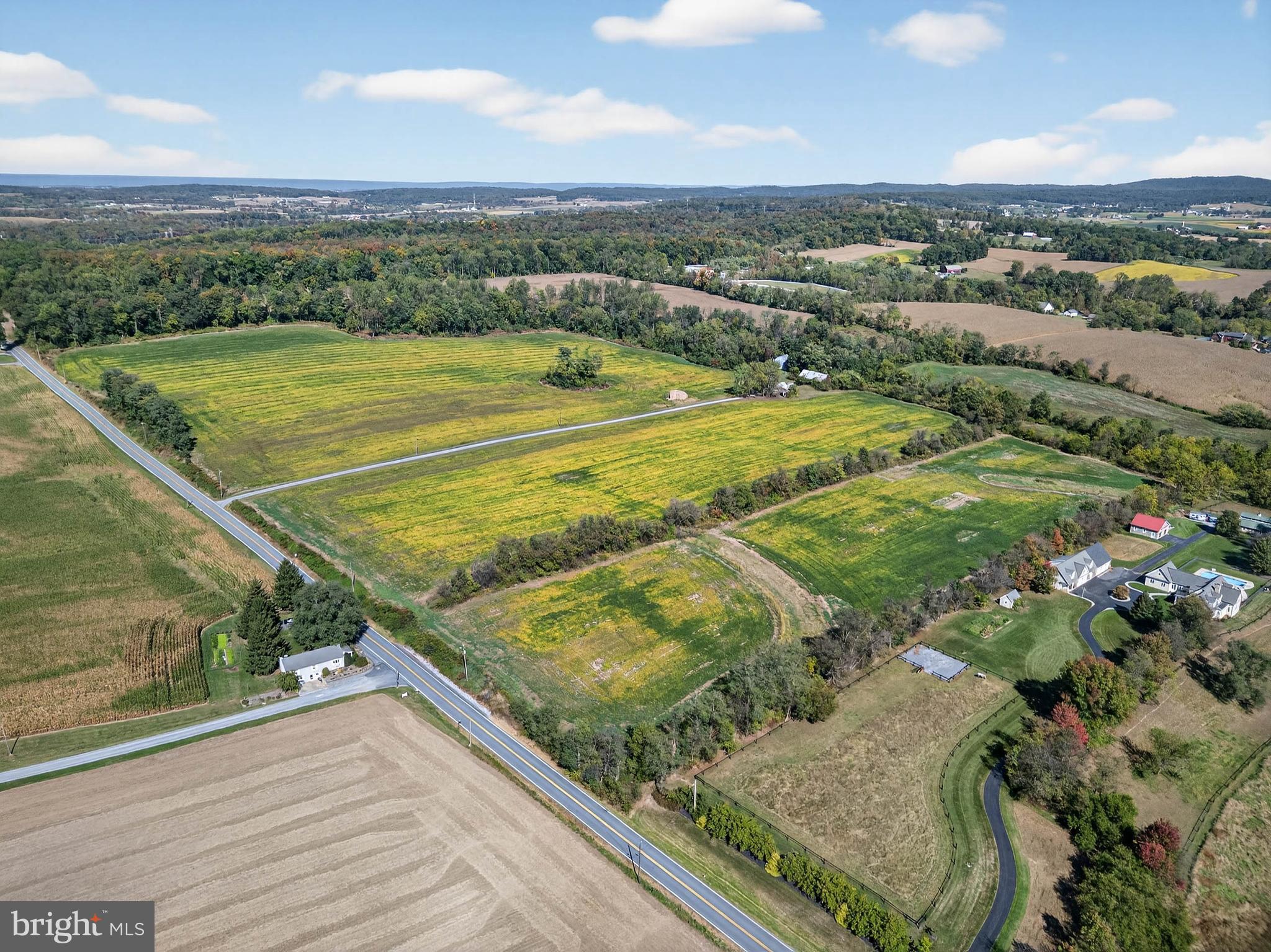 Welcome to 395 Prospect Rd in Elizabethtown, an exceptional opportunity spanning 126.4 acres of picturesque Lancaster County countryside. Zoned for agricultural use, this expansive property offers a rare blend of income potential, open farmland, and serene rural living.
Tucked away along a private gravel lane, the setting provides a peaceful retreat surrounded by rolling fields, mature greenery, and wide-open skies, well-suited for a variety of uses, investment potential, or those seeking a private setting. A tree-lined pond enhances the property, offering a scenic and secluded natural feature.
The property includes a charming farmhouse residence, originally built in the late 1800s, offering timeless character alongside functional living space. A three-bedroom, one-bath rental home, featuring a cozy wood stove great for cold weather, inviting porch perfect for morning coffee or evening relaxation, summer kitchen, and a classic stone shed, enhancing both charm and utility.
With multiple income streams already in place, including farmland leasing and residential rental, this property presents strong potential for a range of opportunities.
Despite its tranquil setting, the location offers convenient access to everyday amenities. Just minutes from downtown Elizabethtown, Elizabethtown College, local shops, dining, and Route 283, this property combines rural surroundings with accessibility.
Whether continuing its current use, exploring investment opportunities, or creating a private retreat, this property is ready for its next chapter. Schedule your private tour today.