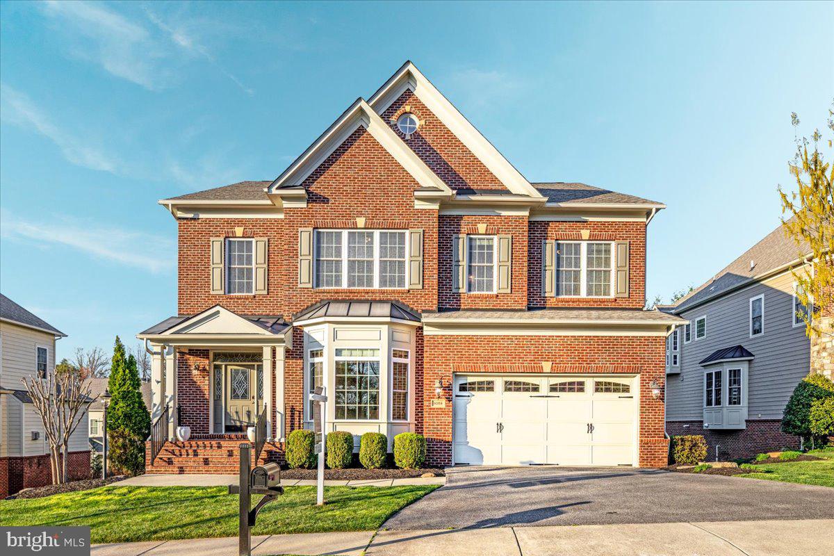 Fabulous 5BR/4.5BA home in premium Oak Hill enclave, The Reserve at Stone Hill. This beautifully upgraded 5200+ sq. ft. home, built in 2011 with over $200K in enhancements, offers elegance, space, and convenience in the sought-after Oakton HS pyramid. The brick and HardiPlank exterior, manicured landscaping, and covered front porch create a warm welcome. Inside, a grand two-story foyer with gleaming hardwood floors and extensive crown molding, leads to a formal dining room with a striking custom stone accent wall and a private main-level office with French doors. Ten foot ceilings on main level. The gourmet kitchen is a chef’s dream, featuring granite countertops, an oversized island, high-end cabinetry, and stainless steel appliances, including a double wall oven, gas cooktop, and vent hood. It opens to a spacious family room with a floor-to-ceiling stone gas fireplace, expanded living space, and large picture windows with custom draperies. Upstairs, the luxurious primary suite boasts a tray ceiling, recessed lighting, a spacious sitting area, and two walk-in closets. The spa-like ensuite bath features granite countertops, a soaking tub, a frameless glass shower, and a private water closet. Three additional bedrooms include a princess suite with a private bath and two that share a Jack-and-Jill bathroom. The fully finished walkout lower level is an entertainer’s dream, featuring a custom bar, stone accent walls, wine storage, and an electric fireplace. A bonus room, fifth bedroom or gym w/cork flooring , and well appointed full bath provide the perfect guest or in-law suite option. The backyard retreat includes an irrigation system, a beautiful stone retaining wall, a paver patio, and a large maintenance-free composite deck. Ideally located near Route 50, Fairfax County Parkway, and Dulles Toll Road, this home offers easy access to Reston Town Center, Fair Oaks Mall and so much more! A true turn-key luxury home.