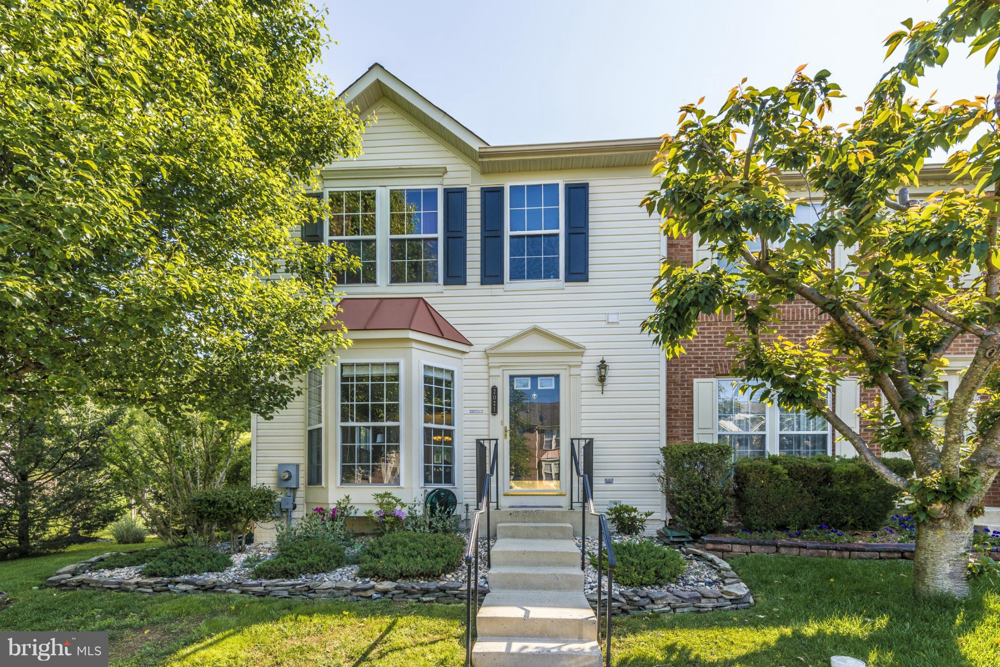 Beautifully maintained end unit TH! Master bathroom w/ separate shower & jetted tub. Vaulted ceilings upstairs w/ 2 skylights. Sep dining room, hardwood floors, newer hot water heater & washer, granite counter tops, security system, home humidifier. Finished basement w/ bathroom & bonus room. Fenced backyard w/ patio/pond. Nicely landscaped front to back. Backs to trees & walking trails.