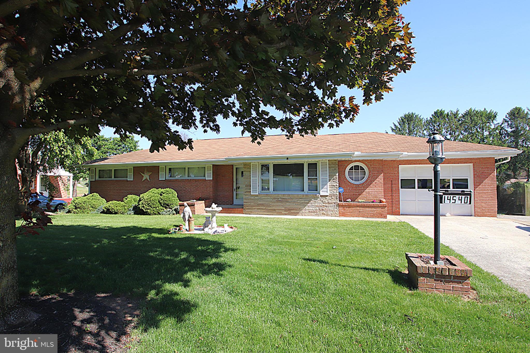 Wonderful brick rancher in desirable Clear Spring - Offering 4 bedrooms, 2 full bathrooms, large Living Room with woodstove, lovely Kitchen open to Dining Room, freshly painted and new carpet throughout (hardwood under carpet). Finished lower level has fourth bedroom, second full bathroom, large Rec Room, Kitchen area, and a walkout door making it perfect for a guest suite or possible income potential. Outside enjoy the new, heated pool or sit on the deck and enjoy the views. Attached garage, plus a 24x24 detached garage with a pit for the car enthusiast or mechanic. Additional 20x47 storage building with pool changing room and a 12x20 pavilion. New septic system & water softener in 2024, brand new hot water heater! This house has so much to offer and is move in ready!