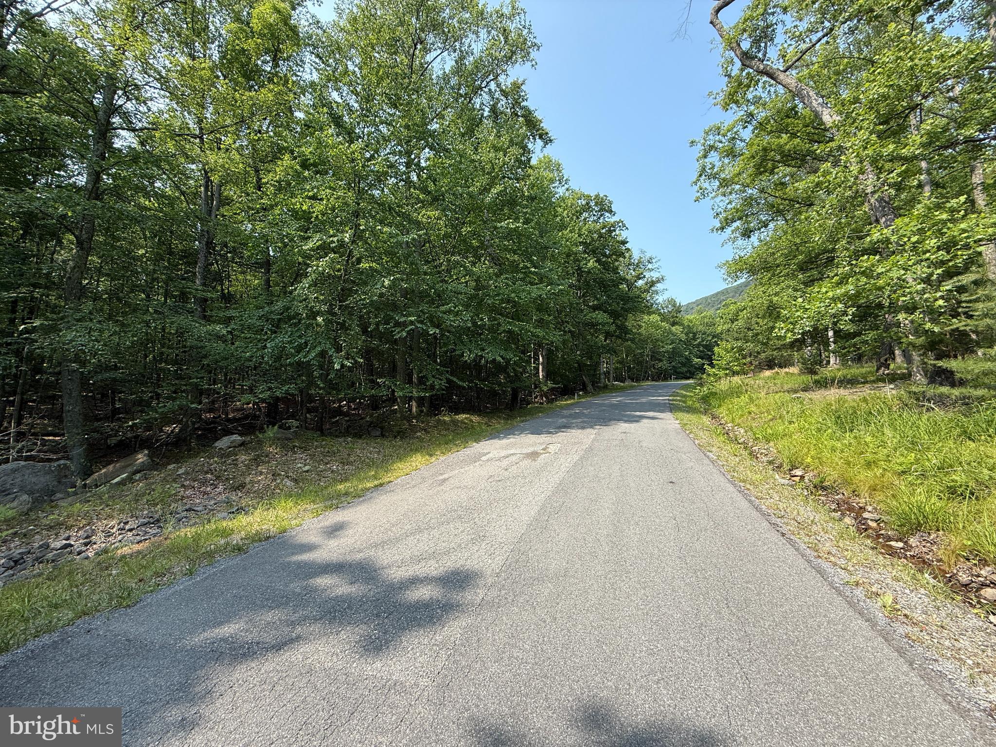 Check out this  3-acre lot in Cacapon East Subdivision, just a short drive to Cacapon State Park where you can enjoy golf, hiking, the lake, and playgrounds. The lot  is just off a paved road. Whether you're looking to build a full-time home or a weekend getaway, this location offers the peace and quiet  while still being close to  Berkeley Springs.