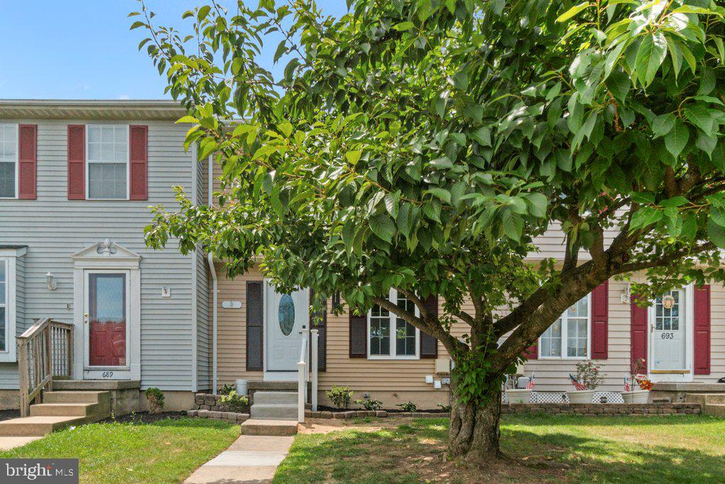 Renovated and move-in ready! This beautiful Millersville townhome features 3 bedrooms, 2 full bathrooms, a renovated kitchen with brand-new stainless steel appliances, updated bathrooms, new fixtures, new windows and doors, a new water heater, and a 2-year-old HVAC system. The main level offers a spacious living room, dining area, and updated kitchen, while the finished lower level includes a large recreation room, full bathroom, and laundry area. Enjoy the warmth of a new electric fireplace and the peace of mind that comes with extensive recent upgrades throughout. Conveniently located near shopping, dining, parks, and major commuter routes. A must-see!