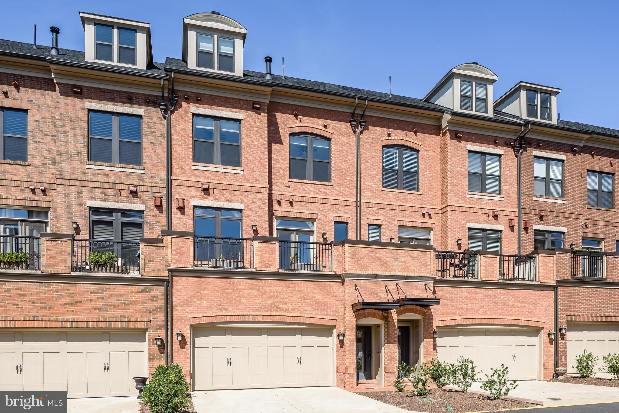 Incredible location in downtown Leesburg in the highly sought after community of Crescent Place. Step into effortless style and comfort with this beautifully updated home packed with standout features designed for both elegance and function. The main living area features BRAND NEW wood floors, a cozy gas fireplace, and a seamless flow to a private deck just off the living space. In the kitchen, a custom-designed granite island that is so large it can double as a kitchen table—perfect for casual meals or hosting friends. The sleek subway tile backsplash, double ovens, built-in wine fridge add a sophisticated touch, making this space a true culinary haven. The room adjacent to kitchen has another dining area along with custom-built desks and cabinetry —a dream for working from home, diving into creative projects, or staying organized. This home does come with a designated space to add an elevator if the owner desires.  The third level features a huge Owner's Suite with 2 custom fitted walk in closets and master bath with oversized shower/bench, dual vanities and granite counters. 2 more spacious bedrooms, hall bathroom and a laundry closet complete the 3rd floor. An upper level loft has another large bedroom with full bath and an expansive living/recreation area featuring sliding doors to a beautiful rooftop terrace with an outdoor gas fireplace and great views of Raflo Park and shops next door. Oversized 2 Car Garage with workshop/storage area and driveway can accommodate 4 total parking spaces. 

Located just minutes from historic downtown Leesburg, you’ll have access to quaint shops, award-winning restaurants, a lively farmers market, and the scenic W & OD trail. Outdoor enthusiasts will love nearby Ida Lee Park, Morven Park and Rust Sanctuary, perfect for recreation or relaxation. With easy access to Route 7, Route 15, and the Dulles Greenway, commuting is a breeze while still enjoying the charm and tranquility of this peaceful community.

This home is the perfect blend of thoughtful design, modern updates, and an unbeatable location.