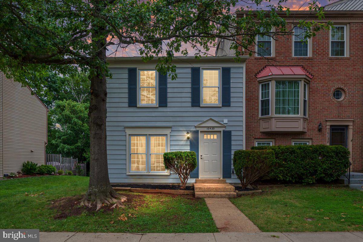 Rarely available and move-in ready, this fee simple end-unit townhome is nestled in the highly sought-after Stonington community and offers the perfect combination of style, comfort, and privacy. Freshly painted in a neutral palette, the home features brand-new luxury vinyl plank flooring throughout the main level and plush new carpet upstairs.

The light-filled kitchen boasts crisp white cabinetry, quartz countertops, stainless steel appliances, and a classic subway tile backsplash. Step outside to the freshly painted deck overlooking a fully fenced backyard that backs to mature trees, creating a peaceful and private outdoor retreat perfect for relaxing or entertaining.

Upstairs, the spacious primary suite features soaring vaulted ceilings, abundant natural light, and a beautifully renovated en-suite bathroom. Two additional bedrooms and an updated hall bath complete the upper level.

Major infrastructure updates provide peace of mind, including a brand-new roof (2026) and newer vinyl replacement windows.

Located in the highly desirable Stonington community, residents enjoy an outstanding array of amenities including swimming pools, tennis and basketball courts, playgrounds, and scenic walking trails.