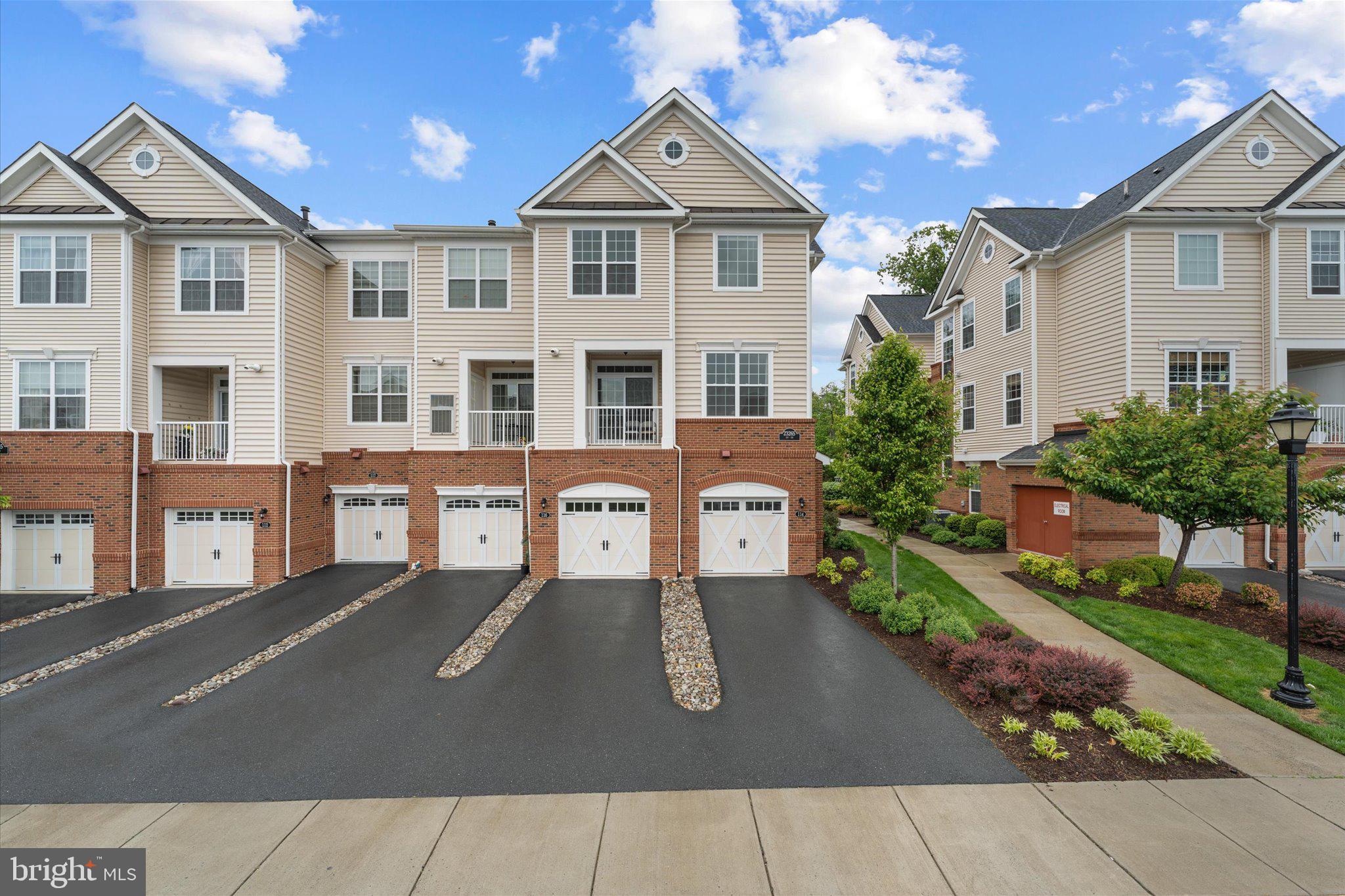 THIS IS AN END UNIT WITH ONLY ONE SIDE SHARING A WALL. Welcome to the highly sought-after Ridges at Loudoun Valley in Ashburn! This beautifully updated 2-bedroom, 2.5-bath condo-style townhome offers the perfect blend of style, comfort, and convenience. A rare end-unit with no neighbors above or below, this home lives large with AMAZING natural light pouring through every level — so bright you’ll barely need to turn the lights on!
Thoughtfully upgraded throughout, this true gem features updated kitchen countertops, modern cabinetry, refreshed flooring, stylish wood paneling, and upgraded railings that add warmth and character to the space. The open and inviting layout is ideal for both everyday living and entertaining. Each bedroom has its own bathroom! Plus the half bathroom on the main floor. One car garage with ample space!
Enjoy all the incredible community amenities including outdoor pools, basketball courts, pickleball courts, tot lots/playgrounds, picnic areas, game room, and beautifully maintained common grounds. Conveniently located close to major commuter routes, shopping, dining, and scenic walking trails, this home offers the best of Loudoun County living. Don’t miss your chance to own this move-in ready beauty in one of Ashburn’s most desirable communities!