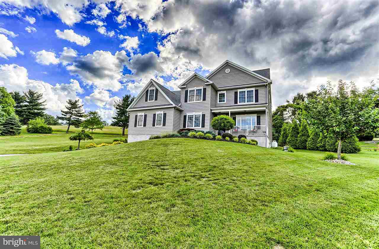 Stunning home that sets beautifully on 1.1 acres with views for miles!  This is a true 6 bedroom home that has all the room anyone could ask for!  You'll love all the high end features of the home and the lower level is great for an in-law suite or the perfect teenage getaway! Entertaining is a dream on the stamped concrete patio and built in grill and bar! Kids can walk to school too! A rare find like this one!  An easy commute to Lanco or York!