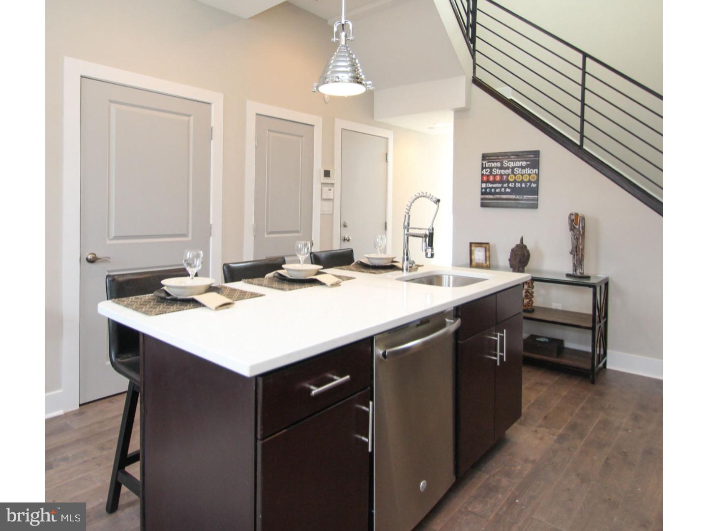 Spectacular Fishtown multi-level unit ready for immediate occupancy. First level features beautiful hardwood floors, living/sitting room area, contemporary kitchen with quartz counters, and stainless steel appliances. Second floor is huge master suite with spacious bedroom area and ultra modern bathroom ceramic bathroom. Lower level contains one sizable bedroom, full ceramic bath and additional room which is ideal for office/small bedroom. Over 1400 sq ft of living space! Great location! Convenient to public transportation, Cedar Point Bar, Pizza Brain, Philadelphia Brewing Company, Loco Pez, and much more!
