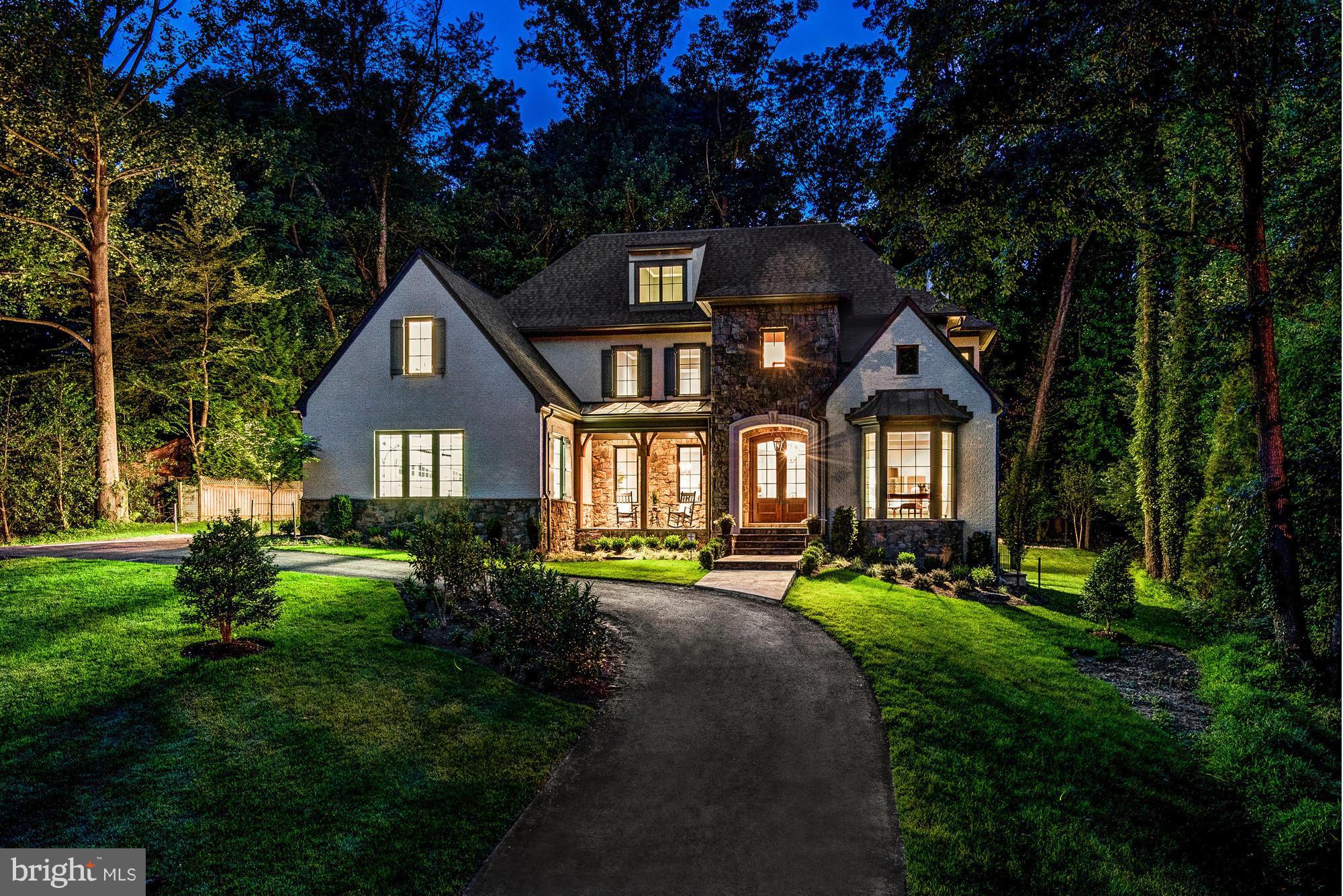 Stunning new stone & brick manor home by Bethesda Builders sited atop incredible lot in heart of Franklin Park! Approx 7,100sqft on 3 lvls w/5BR UP & 3 car GAR. Loads of natural light. Truly beautiful finishes & details-10ft ceilings, designer lighting, custom tile & cabinetry, opt. elevator. Wonderful floor plan.  Great outdoor spaces w/room for future pool. Very private-Backs to FFX County land!