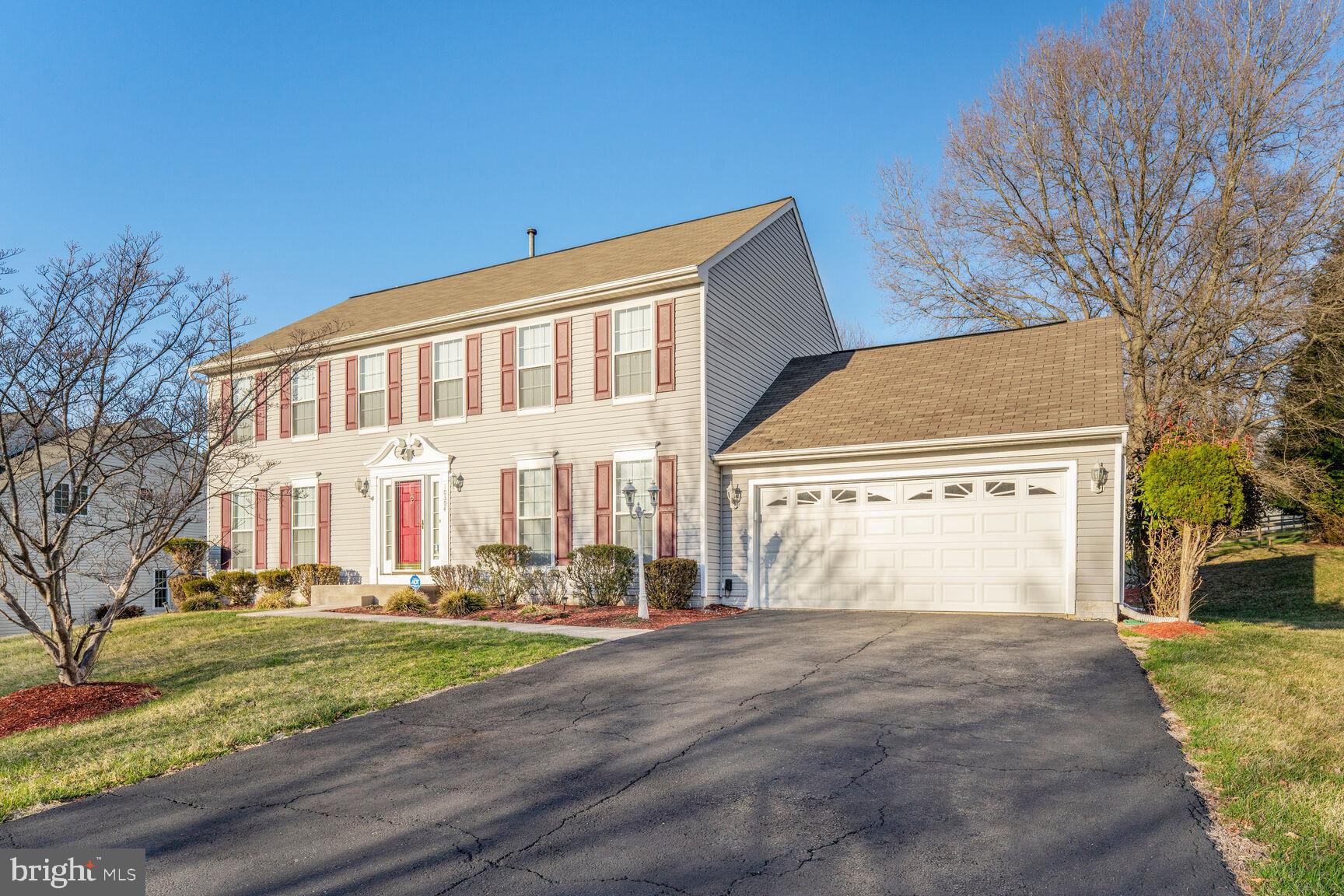 STATELY COLONIAL RESIDENCE! Step into timeless sophistication with this move-in-ready colonial home, offering an impressive 3,696 square feet of living space, a 2-YEAR NEW HVAC SYSTEM, 4-YEAR NEW HOT WATER HEATER and MANY MORE UPDATES.  The property is truly designed for comfort and gracious living. This amazing residence features four generously sized bedrooms (basement den can easily serve as 5th, 3.5 baths, a fully FINISHED WALKOUT BASEMENT,   and fresh paint throughout. Do not miss the show-off primary bath with SHOWER ROOM with glass door, double sinks and soaking tub with an enclosed television.  That's right a soaking tub with an ENCLOSED TELEVISION! Upon entering, you’ll be captivated by the gleaming hardwood floors that grace the foyer, staircase, and upper-level hallway, while each of the four bedrooms showcases stunning, low-maintenance laminate flooring. The chef’s kitchen is a masterpiece, boasting UNDER CABINET MOTION SENSOR LIGHTING that comes on automatically when you enter the kitchen, pristine white cabinetry, granite countertops, premium stainless-steel appliances, a designer backsplash, and a stylish center island—a perfect blend of sophistication and functionality. Seamlessly connected to the kitchen, the inviting family room offers warmth and ambiance with a cozy gas fireplace and convenient ceiling fan. The fully finished walkout basement provides endless possibilities with a spacious recreation room, a full third bath, and an additional den that can serve as a fifth bedroom, a private home office or maybe even a theater room. For your convenience, the two-car garage ensures effortless parking and storage. Additionally, this home is equipped with a BACK-UP GENERATOR,  offering peace of mind during power outages, plus an IRRIGATION SYSTEM to keep your lawn vibrant all summer long. There's more, do not miss the exterior STORAGE SHRED.  With its classic charm, modern amenities, and attention to detail, this home is a gem. Schedule your private tour today.  This opportunity won’t last!