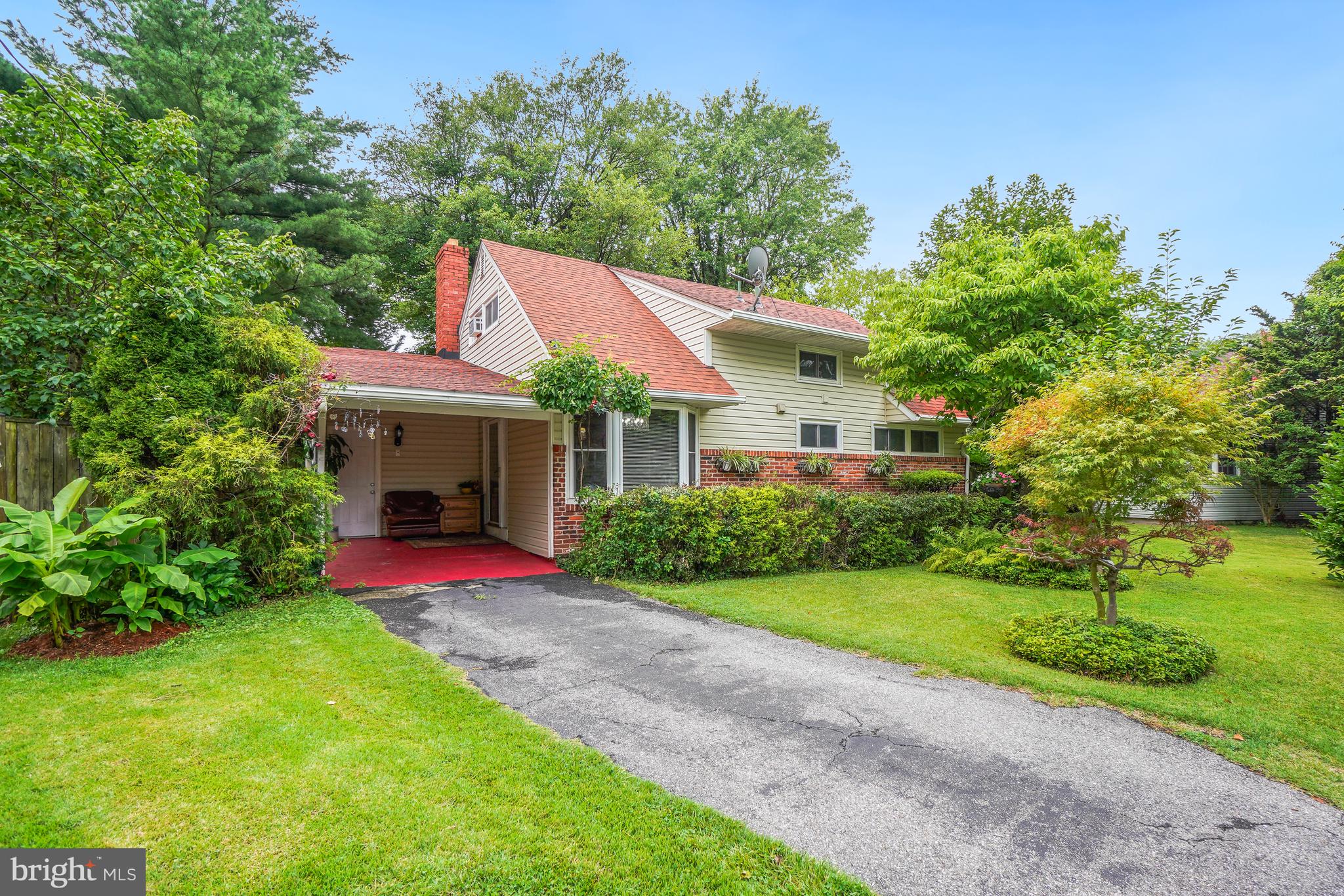 The Fantastic Value You've ALL Been Waiting for! Located on a Private Cul-de-Sac in a Truly Secluded Setting ....  Enjoy Easy Covered Parking, Walk to Metro, Shopping, Restaurants, Schools & All the Amenities of Rockville Town Square and Judicial Center! Enter Your Elegant Kitchen through a Solid, Insulated Door with Sidelights. Enjoy the Open Concept View to Family Room with Scenes of the Deck in a Level, Secluded Back Yard. Tall Cabinets, a Sparkling Backsplash / Wall Accent and Large Bay Window! Beautifully Remodeled Bathroom with a Huge, Walk-in Shower! Two Main Level Bedrooms & Two Large Upper Bedrooms with Bath.... This Home Enjoys SO Many Lovely, Remodeled features, A MUST SEE! HVAC System Approximately 2 Years, Roof Approximately 3 Years. The Remarkable Yard is Secluded and features Organic Fruit Trees! Continue to Cultivate or Simply Enjoy their Privacy. Persimmon, Kiwi, Apple & Pear Trees include Asian Pear .... Grapes, Plum,  Fig & Guava .... HURRY!! You'll Love it As Much As They Did!!!