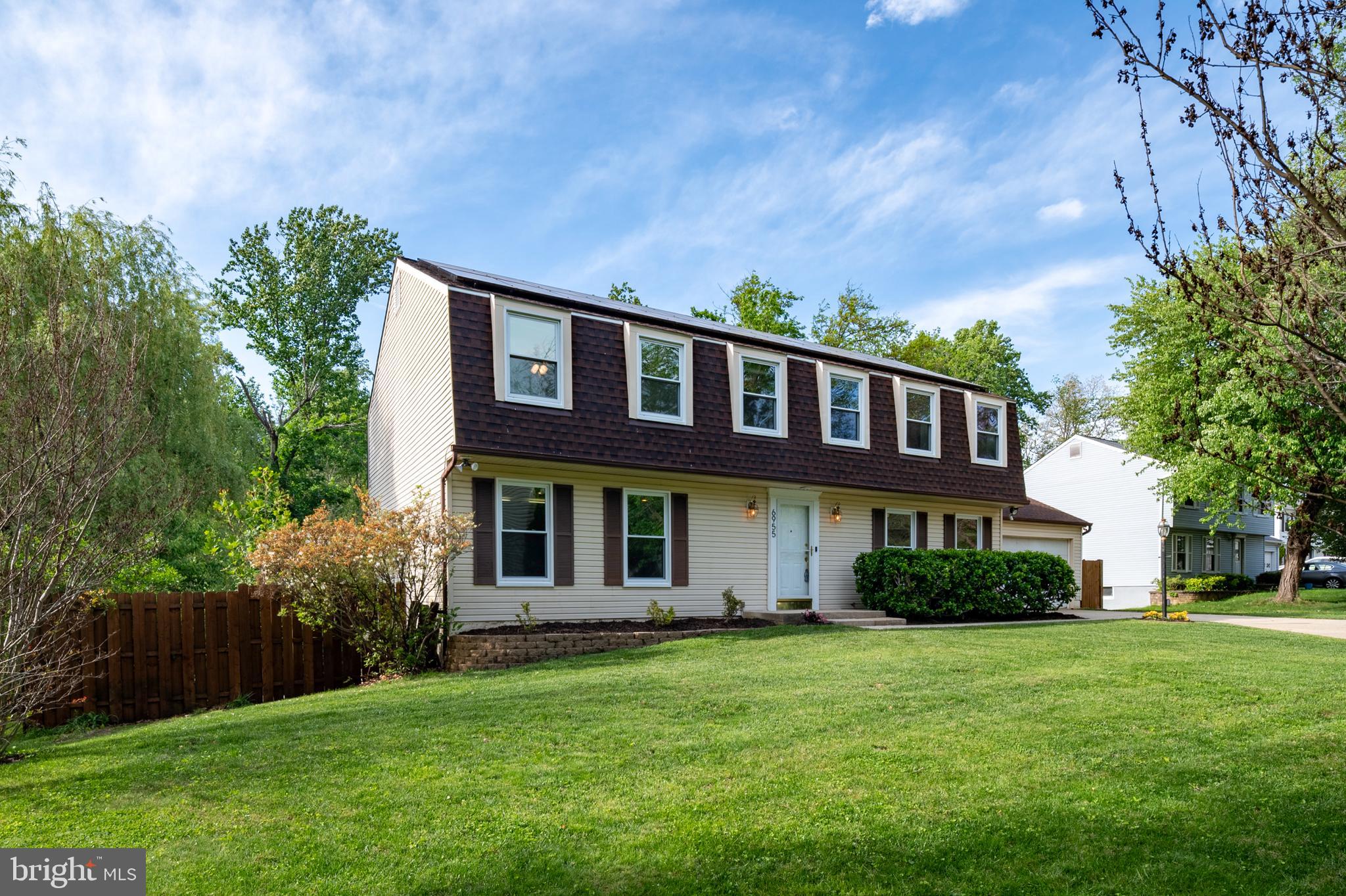 A fantastic 5-bedroom, 3.5-bath Colonial with an oversized 2-car attached garage on a cul-de-sac in beautiful Owen Brown!  Solar panels are owned by the seller and convey, averaging under $50/month in electric bills.  The main level has been freshly painted, has recessed lighting throughout and offers a large living room with built-in bookshelves, separate dining room, an updated kitchen featuring maple cabinets, granite counters, and stainless-steel appliances and an eat-in area open to a large family room with deck access.   The main level also includes a powder room, mudroom, kitchen pantry (with an optional main level laundry hookup for a stacked setup) and access to the oversized two-car garage which includes a workshop area.  The family room opens to a large updated Trex deck with a pergola and retractable awning overlooking the stream and woods behind the house and is ideal for a morning coffee or a summer cookout.  Upstairs has been freshly painted and offers 5 bedrooms with ceiling fans, 2 full bathrooms including a large primary suite with an ensuite bath & 2 closets (bonus feature - a laundry chute to the lower level).  4 additional bedrooms on the upper level and a hall full bath with 2 sinks and a hallway linen closet. The front middle bedroom closet provides stair access to a plywood-floored attic with additional storage capacity and additional insulation has been added for energy efficiency.  The walkout basement is mostly finished with fresh paint, ceramic tile throughout, and includes a full bath, making it flexible as a recreation room, guest suite, home office, or all three. The basement includes a large storage room with plenty of storage shelves.  The walkout leads directly to the flagstone patio under the deck where there is a large hot tub/swim spa, plenty of room to entertain and the backyard is fully fenced. Other updates include a 2019 roof, HVAC replaced within the last three to four years, updated windows, and fresh paint on all three levels plus ethernet wiring throughout the home.  The Columbia Association pathways start right at the cul-de-sac and connect to Lake Elkhorn, the 37-acre reservoir with a 2-mile paved loop trail, spring trout stocking, picnic pavilions, and access to the Patuxent Branch Trail extending miles further toward Savage Park. Oakland Mills Village Center, The Other Barn, and the pedestrian bridge walk to the Mall in Columbia are all within easy reach as well. This location also offers great access for commuters, being close to Route 29, 32, I95, BWI, Fort Meade/NSA, and the MARC train.