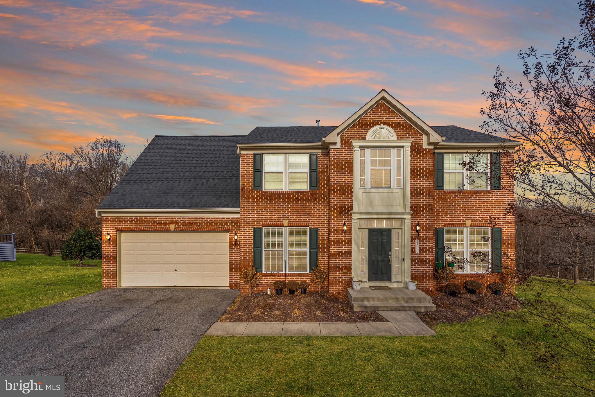 Set on a sprawling 1.45 Acres, this beautiful 3,748 SF brick colonial is ready for you to move right in. Some standout features of the home include: solid oak floors on the main level, main level bedroom with en-suite full bathroom, finished basement, fully remodeled kitchen (2020), soaring ceilings, luxurious Primary Suite, and attached 2-car garage. 

 ● MAIN LEVEL: Enter into a grand, 2-story foyer flooded with natural light and enjoy an easy flowing floor plan on the main level. The kitchen-dining-living rooms are all connected at the back of the home, making a perfect space for socializing and entertaining. The entire rear wall of the home is windows, bringing a peaceful serenity to the space overlooking the large lot backing to woods. Featuring quartz countertops, stainless appliances, newer cabinetry, a peninsula with seating and a proper pantry, this kitchen is a chef’s dream! In addition to the bedroom with en-suite full bath, the main level also features a flexible front room (currently used as office but can be a formal living room or formal dining room), access to the large 2-car garage, access to the newly finished basement, and an opportunity to add a rear deck off the dining area. 

 ● The UPPER LEVEL features a beautiful primary suite along with 3 ample-sized bedrooms and a full hallway bath. The Primary Suite receives tons of natural light through large windows and also offers peaceful views of the rear lot & woods. The en-suite bathroom features a large soaking tub with separate spacious shower and dual sinks. The extra-large walk-in closet is a real cherry on top! 

 ● LOWER LEVEL: The current owners recently finished the walk-out basement, adding an additional  1,200 finished SF of living space - including a large rec room area, a half bathroom, and a bonus room (office, gym, media room, guest room…). 

 ● SYSTEMS: Almost all systems and appliances have been updated recently: Roof 2018, HVAC 2017, Kitchen appliances 2020 (except microwave 2024), W/D est. 2020. 

 ● COMMUNITY: The HOA Community, Vistas at Gallahan, was built in 2009 by Ryan Homes. The total monthly community fee is $165, which includes both HOA and Deferred Water & Sewer payments. The HOA portion is $56.67/months (payable quarterly) and covers all community landscaping, grounds improvement and professional management by local firm, H&E Management Associates. The deferred water & sewer portion is $108.37/mo (payable annually to Gallahan Farm Water & Sewer) and has only 7 years remaining.