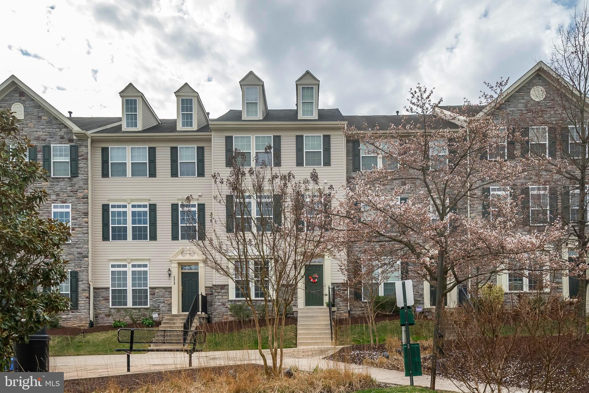 Experience easy living in this beautifully updated townhome in Belmont Station, offering unmatched convenience in sought-after Howard County. The Fairgate model combines timeless design with thoughtful details, making it perfect for any lifestyle.

This spacious home features 3 bedrooms, including a primary suite with a vaulted ceiling, walk-in closet, spacious loft, and a luxurious ensuite bath with double sinks, a large soaking tub, and an updated shower.
 
The mid-level boasts upgraded ‘wood feel’ Rocaille waterproof LVP flooring, a bright, open living room with abundant natural light, and a gourmet kitchen equipped with stainless steel appliances, 42-inch cabinetry, a hand-laid backsplash, and stunning marble countertops. The kitchen also features an extended island, ideal for entertaining. Step outside to a composite deck, complete with a retractable screen door for added comfort.

The entry level includes a private room with elegant glass doors, perfect for a home office, gym, or playroom. A convenient laundry room with shelving leads to the spacious 2-car garage, offering ample room for both vehicles and storage.

Take advantage of Belmont Station’s top-tier amenities, including a pool, fitness center, and clubhouse just steps away. The community also offers scenic walking trails, a playground, and the benefit of low-maintenance living with yard care and snow removal provided.

Located just minutes from major highways (MD 100/95/295/195), this home offers easy access to BWI, Downtown Columbia, Arundel Mills, Baltimore, DC, and more. Plus, Troy Hill Park is just across Rt. 1, adding more outdoor recreation options to your doorstep.

Meticulously maintained by its original, pet-free owner, this home is in pristine, move-in-ready condition, with neutral tones throughout. Don’t miss the chance to make this dream home yours!

*UPDATES*:
Updated exterior lights – March 2025
Brand new roof (architectural shingles) – December 2024
Exterior dormers painted – December 2024
Updated mid-level bathroom – September 2022
Updated bathroom lighting (all) – September 2022
Updated disposal - August 2022
Updated water heater - July 2020
Updated luxury kitchen – January 2019
Updated primary bathroom – January 2019
Updated mid-level flooring – January 2019