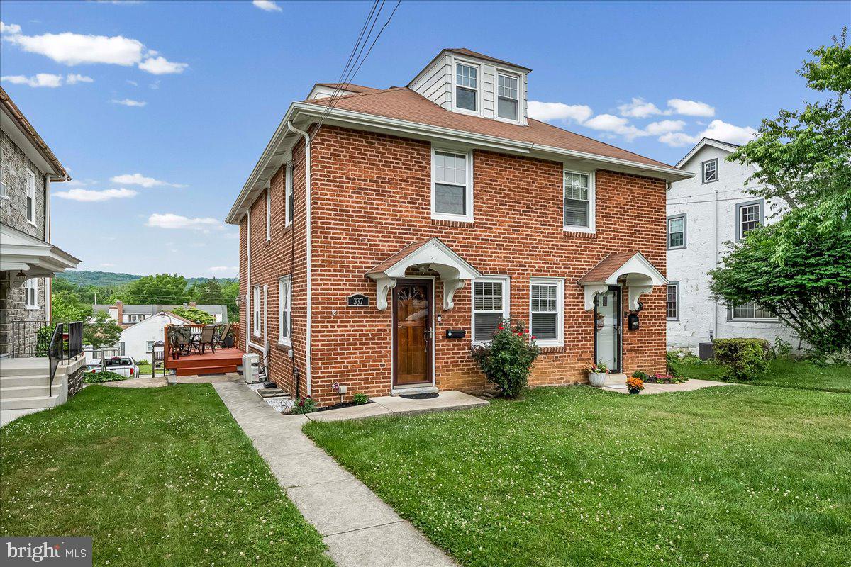 A rare opportunity to own this well maintained Brick Twin home in highly sought after Downingtown Boro is now available to view. Upon your arrival you will be greeted by the nicely landscaped front/side of the property.  Enter the spacious Living Room where you will see the gleaming hardwood flooring, large windows, ceiling fan, open staircase to the 2nd floor and the architectural arch leading to the Dining Room. The hardwood flooring continues into the large Dining Room offering a modern chandelier, chair rail molding and double window. Next, your tour will flow into the gourmet Kitchen boasting wood cabinetry, tiled backsplash, stainless steel appliances & sink, granite counter tops, The Kitchen door exits to the oversized, freshly stained wood deck with a beautiful view of the horizon. Off to the 2nd floor to view  2 Bedrooms each consisting of a large closet, ceiling fan,  large windows and carpeting. The Full Bath completes this level. The 3rd floor is currently being utilized as a bedroom, but this flex space may also be a home office. The property has off-street parking for 3 cars which is accessed from the alley behind the house. Additional parking is available on street as well. Other highlights include the walk-ability to the SEPTA train station , parks, trails, award winning Downingtown West HS, STEM Academy, little league baseball fields, restaurants and more. You can also watch the 4th of July fireworks from your deck!!!