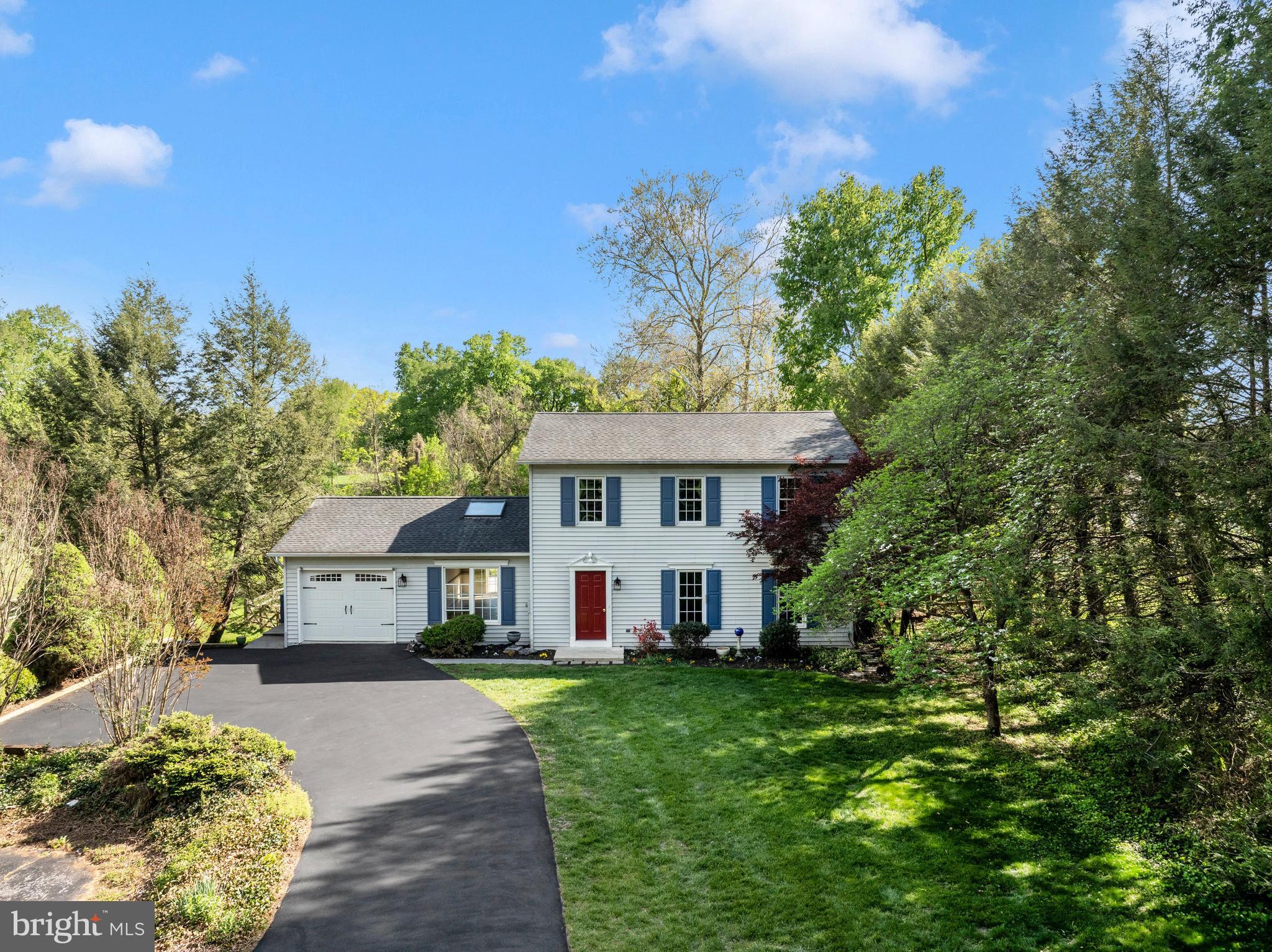 Charming 3 bedroom, 2.5 bath Colonial located in the desirable Williamsport school district! This well maintained home offers a spacious, functional layout perfect for everyday living and entertaining.

The main level features a large formal living room with beautiful wood flooring, crown molding, and abundant natural light. This space flows seamlessly into the formal dining room, accented with crown molding and chair rail. The kitchen offers plenty of cabinetry, ceramic tile flooring, and a breakfast bar that opens to the dining area, creating a great layout for both daily living and hosting.

Just off the kitchen, the inviting family room features a cathedral ceiling with skylights, beautiful ceramic tile flooring, and abundant natural light. A sliding glass door leads to the deck, creating easy indoor outdoor living.

Separately, through French doors off the dining room, step into the stunning sunroom featuring cathedral ceilings, recessed lighting, and beautiful ceramic tile flooring. A cozy gas stove adds warmth and charm, making this light filled space ideal for enjoyment. The sunroom also offers direct access to the expansive deck.

Upstairs offers new carpet throughout, including a spacious primary suite with an updated full bath featuring a walk in shower and a large walk in closet with ample shelving and storage. A full hall bath with ceramic tile flooring and a granite countertop serves the additional bedrooms.

The finished lower level includes a cozy rec/family room with built ins, a laundry area, and plenty of storage.

Step outside to the impressive deck, which offers a convenient wraparound entry from the front/side of the home, creating a welcoming outdoor transition. The deck also features extra wide steps that lead down to a spacious, beautiful  fenced backyard, perfect for gatherings, play, or simply enjoying the outdoors. The yard extends to a serene stream at the rear of the property, highlighted by a charming bridge that adds to the peaceful, park like setting.

Want chickens? You’re in luck, this property features a charming chicken coop that can convey!

Complete with a 1 car garage and ample parking. Schedule your tour today!