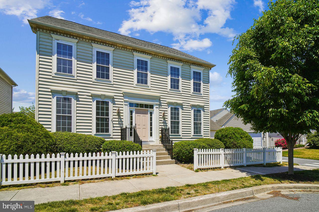 Welcome to Cannery Village, one of Milton's most sought after communities.  This elegant and refreshing two-story retreat is within walking distance to Old Town Milton with its unique shops and businesses.  The delicious local dining choices are unique to the town.   Enjoy your walk to Dogfish Head Brewery, the Milton Theater,  and Milton's Farmer's Market.  

When stepping onto the front porch you will experience the crisp curb appeal of this beautifully freshly painted home.  From the moment you cross the threshold into the soaring two-story foyer, you are bathed in natural light; to your left, a sun-drenched living room features brand-new carpeting, offering the perfect spot for quiet relaxation.  To the right, the formal dining room connects seamlessly to a spacious kitchen via a convenient butler pantry--- boasting ample cabinet storage for effortless entertaining.

The foyer entices you forward towards the family room which shows off its expansiveness with nine-foot ceilings and windows everywhere.  At the heart of the home, this open-concept family room invites you to unwind by the cozy fireplace, creating an ideal atmosphere for chilly evenings.   The kitchen is adjacent to the family room with a large center island, two built in wall ovens, and backsplash.  The laundry room with the washer and dryer (that convey) is off the kitchen.  The main floor also features a stylishly updated, freshly painted power room with a new mirror.

Follow the bright, airy windows up the staircase to find the private quarters, featuring four generous bedrooms, and two full baths.  The large primary bedroom with its tray ceiling, walk-in closet, ensuite with a large soaking tub and shower with windows that again allow the sun to shine brightly in the room.  From the primary bedroom look across the large central area towards the light from the two-story front entrance surrounded by three additional bedrooms with large closets and another full bath.

Off the family room , walk down the newly carpeted stairway to the large unfinished basement with areas of rough-in plumbing for possible bathroom, shower, and or wet-bar area, a large hot water heater, updated and still under warranty HVAC system.  The basement walls have been covered with insulation ready for finishing the walls.  There is a door in this area that leads to the extra wide stairwell up to the backyard of the home.  

This home is positioned on a spacious corner lot, offering enhanced privacy, large backyard, and curb appeal. The white fencing on both sides provides privacy ideal for backyard entertainment. The detached garage is spacious for vehicles and additional storage.

Combining modern updates with a warm, functional layout, this home is move-in ready and waiting for you!

WARRANTY:  This property includes a 1 year home warranty, covering major systems and appliances to protect your investment.