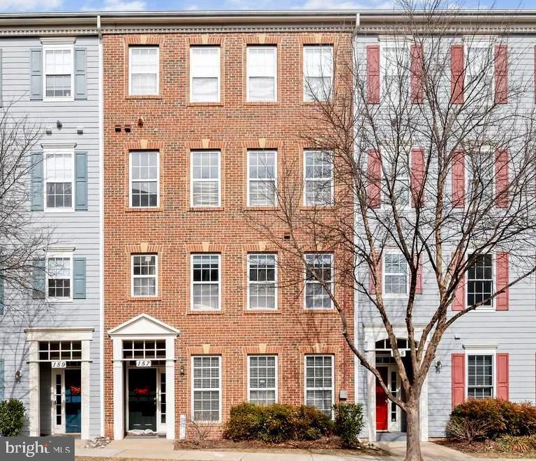 Situated in the sought-after Kentlands Community.  Townhouse-style Condo with an attached 1-car garage.  3 Bedrooms and 2 Full Baths with 1,697 square feet of living space. Main-level hardwood floors and updated living spaces. The Living Room offers 3 large windows and tasteful design notes, such as updated ceiling fixtures, crown molding, and a gas fireplace with a marble surround. The recently renovated Kitchen showcases newer stainless-steel appliances, a new quartz countertop, subway tile backsplash, ceiling light fixtures, and recessed lighting over the sink. The Main Level has a coat closet and access to the 1-car garage. Ascending the stairwell to the upper-level landing awaits, offering a dynamic Office/Bonus Area. The Primary Bedroom boasts a walk-in closet, a second closet, and a ceiling light. The newly renovated ensuite Primary Bath presents designer tiled flooring and a dual vanity with Kohler sinks. The frameless glass door gives a modern look. The upstairs level offers 2 additional Bedrooms, 1 of them including a lighted ceiling fan and a beautiful French door leading to the balcony.