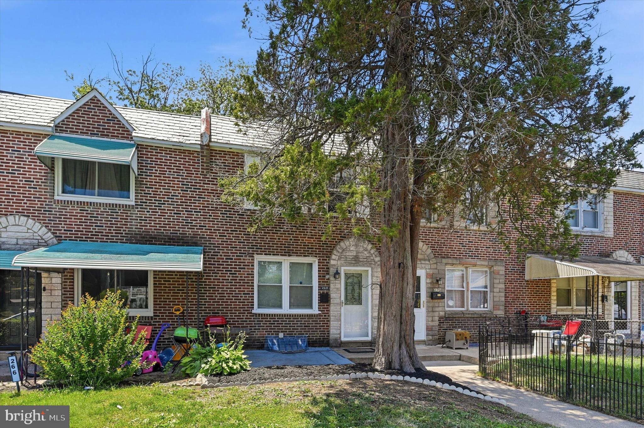 Welcome to 268 Blanchard Rd.! This 3 Bedroom 2 Bath brick townhome in Drexel Hill has your name on it. As you walk up your walkway, prepare to unwind on your front patio or enjoy a picnic on your front lawn with friends. After relaxing on your front patio, step inside your new home and into a bright, cozy living room. As you settle in, the dining area seamlessly opens to the kitchen, complete with a breakfast bar--creating the perfect setting for effortless entertaining.

Upstairs, complete with hardwood flooring, you'll find a spacious primary bedroom, two secondary bedrooms, all with ceiling fans, and a full hallway bathroom with a skylight. The finished basement includes a full bath with a stand-up shower, laundry area with laundry tub, with washer/dryer hookups. The walkout basement offers direct access to the rear garage and private fenced yard.

Your new home is convenient to public transit, parks, shopping and dining. Is this home calling your name. Let's schedule a private walkthrough today.