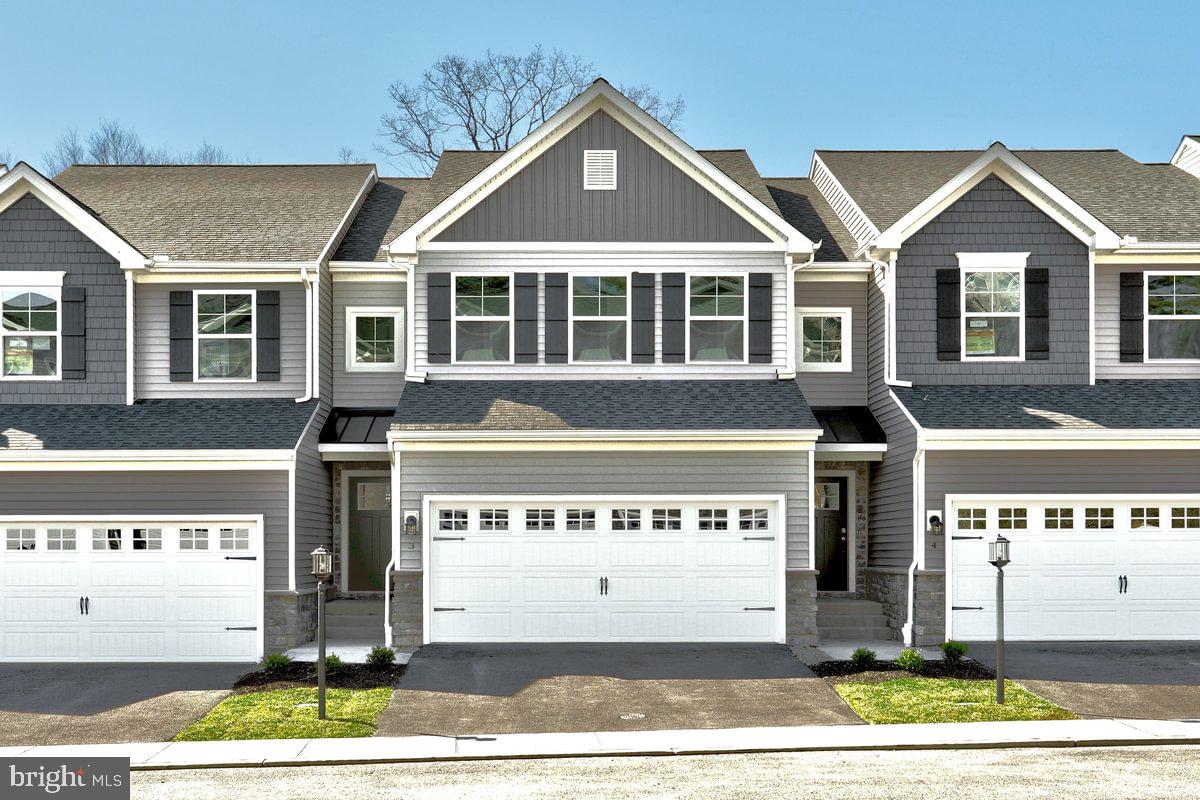 MOVE IN READY!
Discover your new home in the Lilac floorplan townhouse, offering a perfect blend of comfort and style. The main level features an open-concept family room that flows into the breakfast area and kitchen, with easy access to a cozy 10 x 10 deck, ideal for outdoor relaxation. A convenient 1st-floor powder room and a full unfinished basement add practicality and potential to this charming home. Upstairs, the primary suite boasts a full bath and a walk-in closet, complemented by two additional bedrooms, a full bathroom, and a laundry area for added convenience. With a 10-year warranty included, this home is designed to provide peace of mind and long-lasting value. Contact us today to make this beautiful townhouse yours!

The photos used in this MLS listing are representative of the subject property and may include upgrades and features that are not present in this home. Please verify all details and specifications to ensure they meet your requirements.

The new assessment for this sub-division has yet to be completed; taxes shown in MLS are zero. A new assessment of the improved lot and dwelling will determine the taxes due.