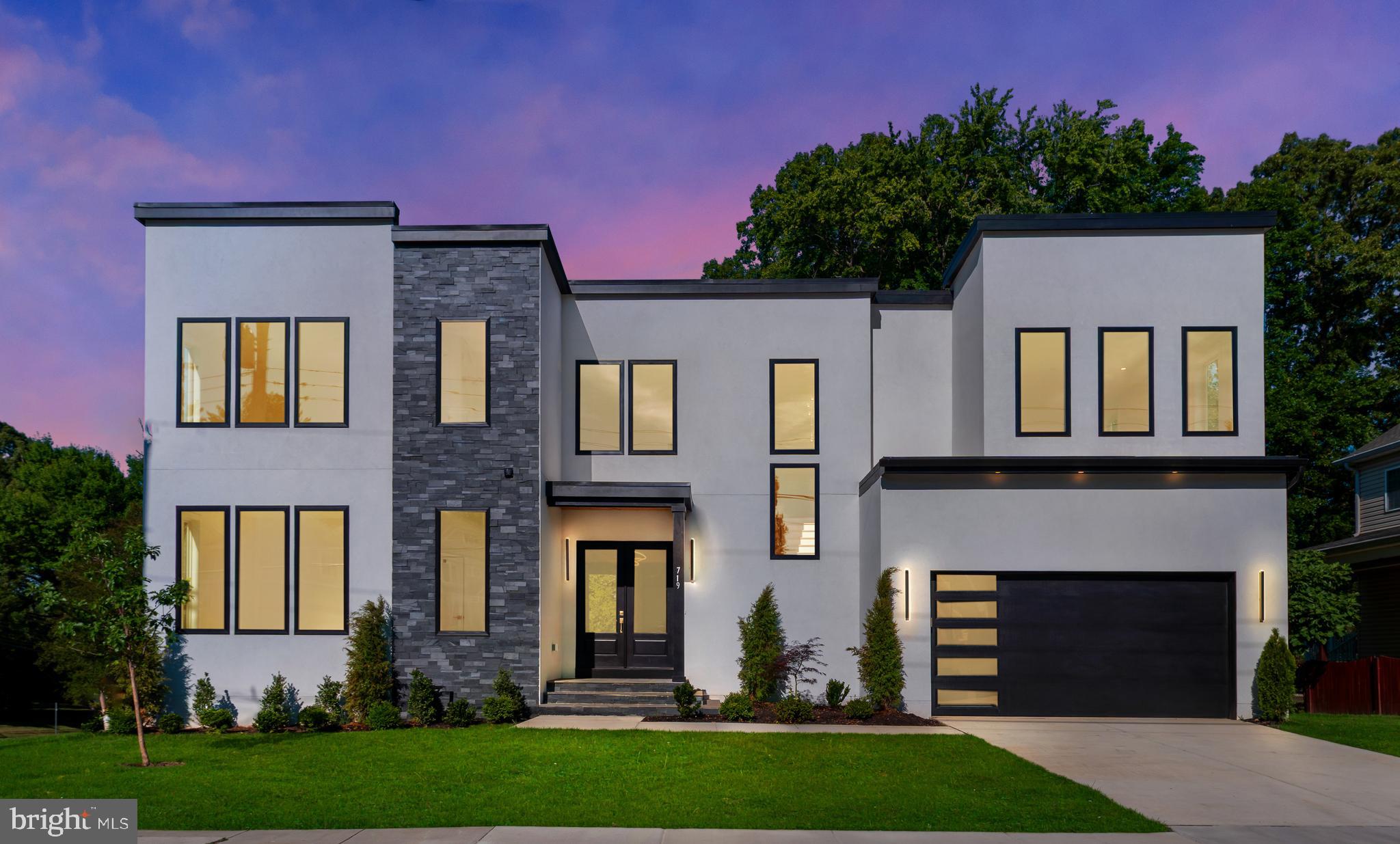 Move-In Ready Luxury in the Heart of Vienna

Welcome to 719 Meadow Lane SW, a stunning new custom home offering over 5,830 square feet of thoughtfully designed luxury living in one of Vienna’s most desirable locations. With 6 bedrooms, 6.5 baths, a main-level guest suite, private office, loft, finished lower level, wet bar, and fitness room, this exceptional residence seamlessly blends modern elegance with everyday comfort.

At the heart of the home is a spectacular chef’s kitchen designed to impress, featuring a premium Thermador appliance package including a 48-inch built-in refrigerator, 48-inch professional gas range, two dishwashers, and two convenient drawer microwaves. Additional highlights include a wine and beverage cooler, built-in ice maker, custom cabinetry, walk-in pantry, and an impressive waterfall island that anchors the space—perfect for effortless entertaining and daily living alike.

Expansive Andersen casement windows flood the home with natural light, showcasing the open-concept floor plan, soaring ceilings, and designer finishes throughout. The luxurious owner’s suite serves as a true private retreat, complete with dual walk-in closets and a breathtaking spa-inspired marble bath with premium finishes and timeless sophistication.

The fully finished lower level offers exceptional flexibility, featuring a spacious recreation room, stylish wet bar, dedicated gym, guest bedroom, and full bath—ideal for entertaining, accommodating extended family, or creating a private retreat.

Situated on a desirable corner lot with no HOA, this move-in-ready home offers the rare combination of luxury, location, and convenience. Enjoy being just minutes from Vienna Metro, Tysons Corner, downtown Vienna, parks, shopping, dining, and major commuter routes, making everyday living as convenient as it is elegant.

Luxury finishes. Exceptional craftsmanship. Unbeatable Vienna location.
Don’t miss this rare opportunity to own a remarkable new construction home in the heart of Vienna. Schedule your private tour today.
