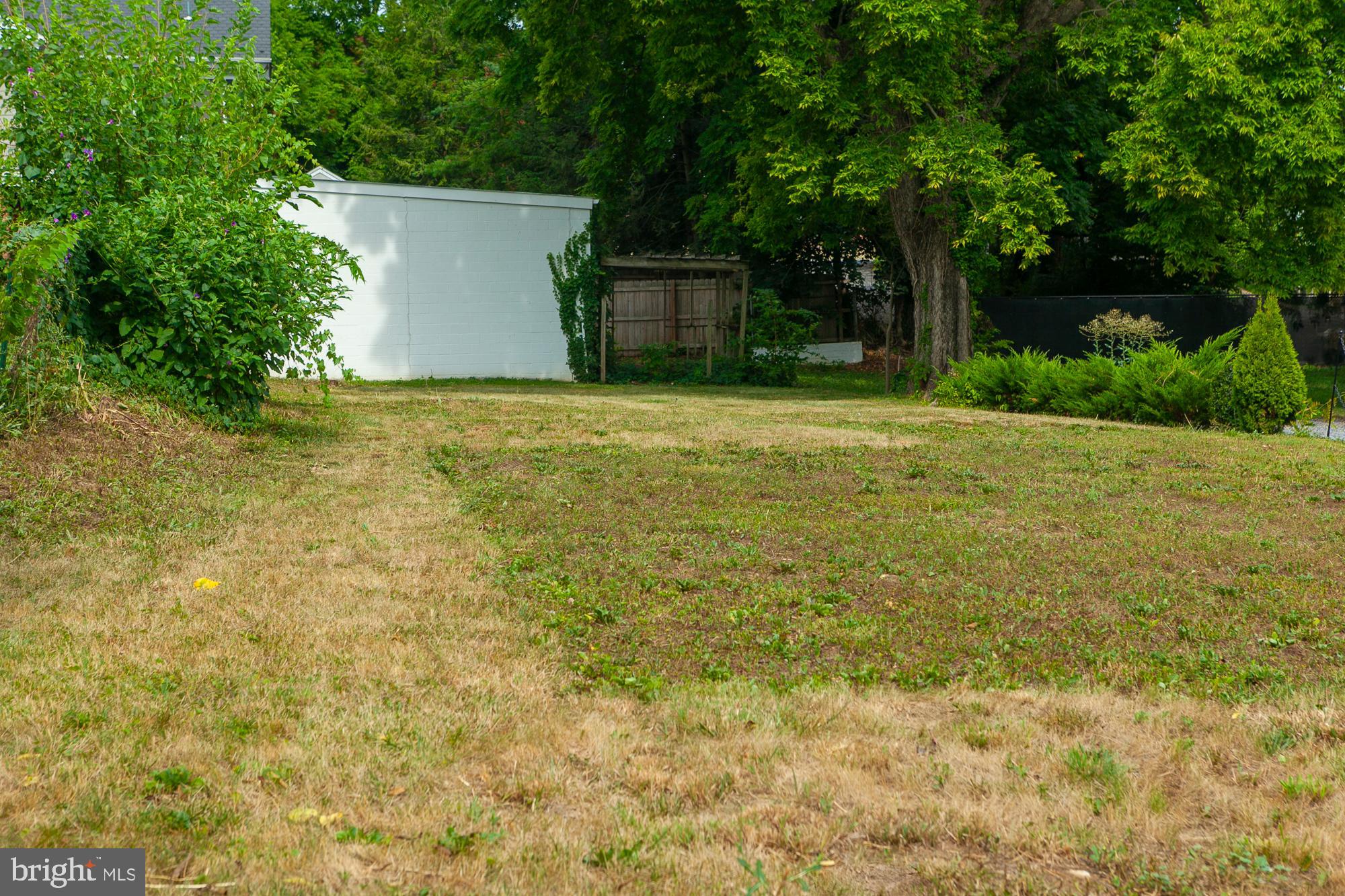 225 South Raleigh St., Martinsburg, WV, Hard to find in town  lot in Martinsburg  provides 4 parking spots   conveniently located near the Marc commuter train station to DC ;  ideal for those who commute regularly.  Downtown location, nearby restaurants,   walking neighborhood, provides four handy  parking spots. Located between two large attractive brick homes.