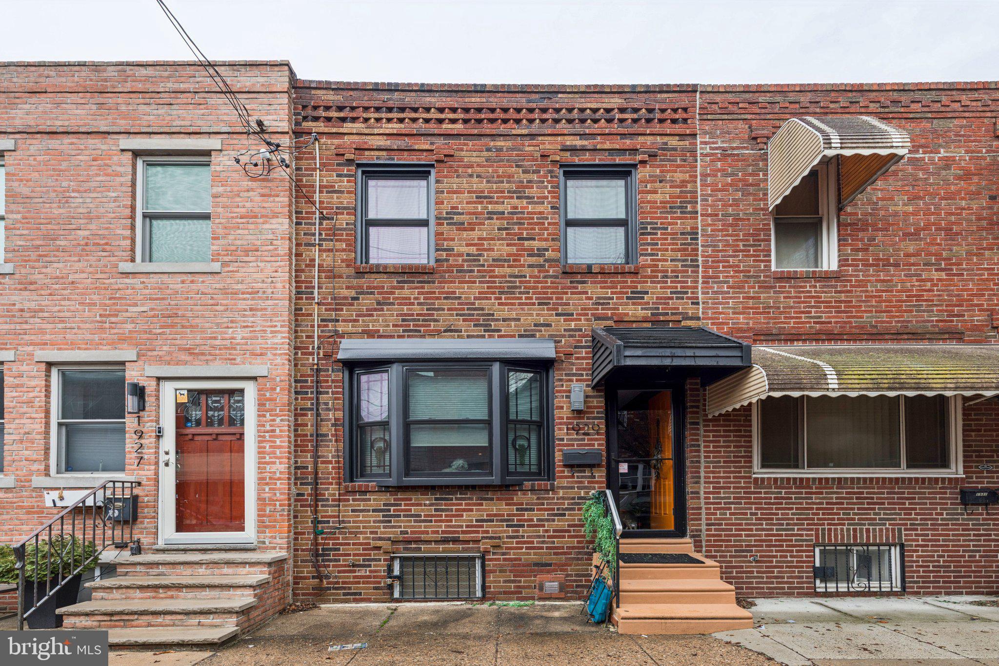 Beautiful home in the heart of Passyunk square Featuring 3 Bedrooms, and 1.5 baths. The first floor offers spacious living room, dining room, and new flooring, leading to s large custom eat in kitchen  with quartz counter tops, tile backsplash, new appliances, and plenty of cabinet space. Access from the kitchen to a large rear yard with a beautiful garden great for entertaining.  Second floor features a wide staircase leading to three nice size bedrooms with ample closets, new wide hardwood linoleum planks, and new large beautiful tile bathroom,  Finished basement includes newer systems, a large laundry room, and plenty of storage. 
Additional  upgrades include new custom anderson black front windows, New heater, Powder room on the first floor,  Located within walking distance to Passyunk Square, Known for its Fabulous restaurants, Cafes, shopping and super markets.