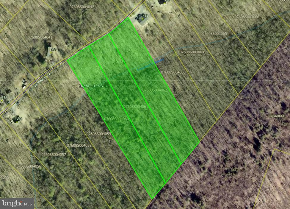 Lots 60, 61, 62 - Located along Alpine Way, just below Supinlick Ridge, this offering includes three adjoining 3-acre parcels for a total of 9 acres within the Alpine Acres subdivision. Set among mature trees and natural landscape, the property offers a quiet, wooded setting ideal for those seeking privacy and a true mountain escape. The combined acreage opens up a range of possibilities, whether you are planning a private retreat, multiple cabins, or a longer-term investment. With multiple potential homesites throughout the property, you have the flexibility to design around the natural terrain while   maintaining separation and seclusion. As part of Alpine Acres, the property offers access to a community well system (connection fee applies), maintained by Valley Water. A septic system will be required, as is typical for the area. The availability of shared water adds convenience and helps streamline the building process.
Just a short drive from Bryce Resort, the location provides easy access to year-round recreation including
skiing, golf, hiking, and more. Short-term rentals are allowed, making this a strong option for those looking to build rental cabins, a personal getaway, or a combination of both. An additional adjoining pair of 3-acre lots is also available, offering the opportunity to expand to a full 15 acres
if desired. Whether you are looking to create a private compound or invest in multiple homesites, this property offers space, flexibility, and a peaceful setting in one of Shenandoah County’s most desirable mountain communities.