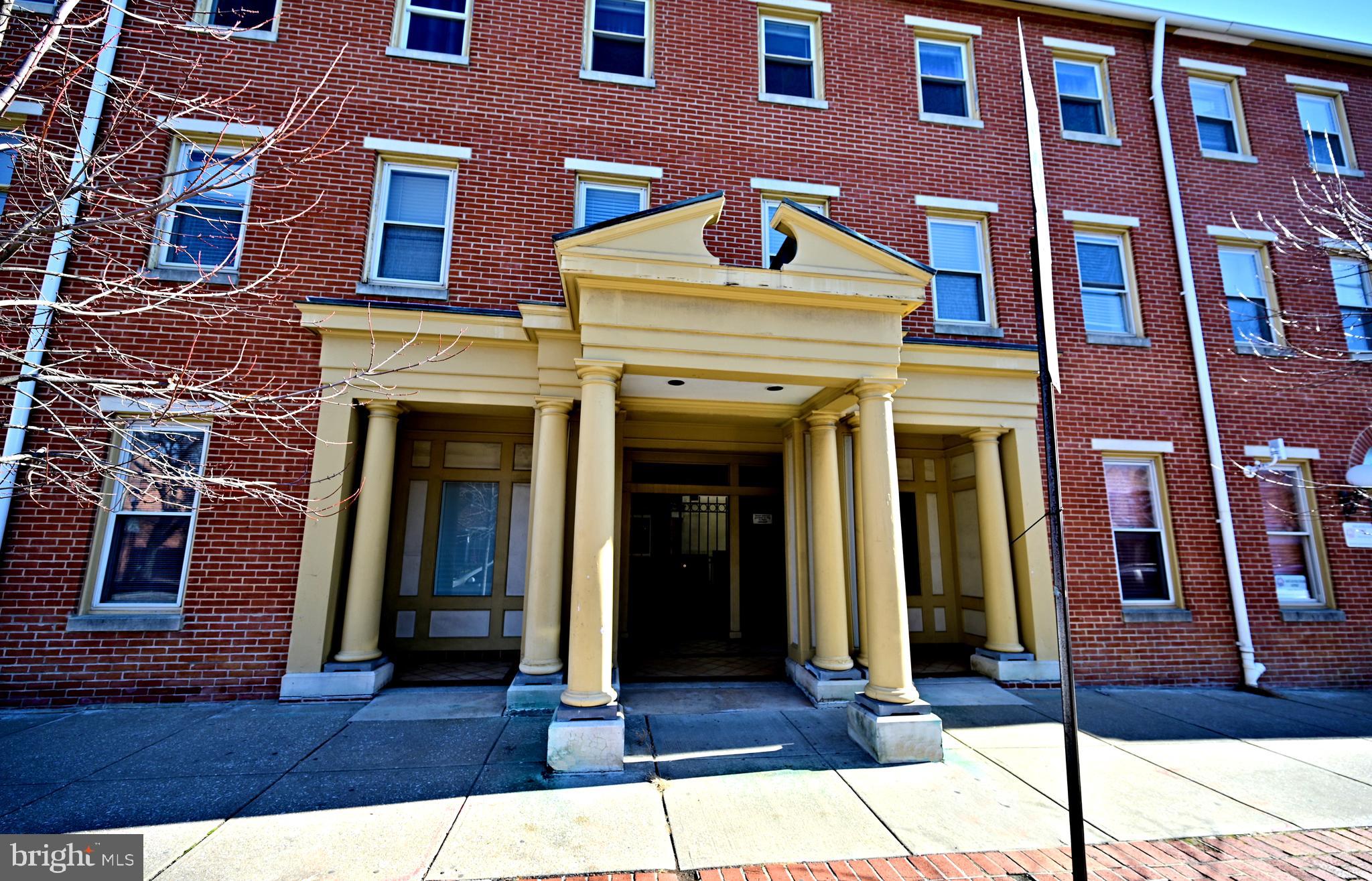 Prime OR-Zoned Commercial Opportunity in Federal Hill. Unit 103. The unit remodeled in 2023 and features a newer HVAC system , providing peace of mind and reduced capital expenditure.  Condo fee $500 a month.

Positioned in the heart of Baltimore’s highly desirable Federal Hill neighborhood, this 1,169 SF ground-level commercial unit offers a rare opportunity for investors or owner-users seeking flexibility, accessibility, and long-term upside. Zoned OR (Office–Residential), this unit can only be used for commercial not residential. The property supports a wide range of professional and institutional uses in one of the city’s most vibrant and walkable districts. Constructed of block and brick, the space offers durability, sound insulation, and minimal maintenance. 

Uses for property are: Professional offices, Medical & Dental offices, Insurance agencies, Nonprofit and Administrative offices, Government or Institutional offices, Counseling Services, Educational or Training Facilities, Photography Studio, and Religious or community offices.

Inside, the layout includes six private rooms—ideal for offices, exam rooms, or consulting spaces, along with one bathroom and a dedicated laundry room.  Four of the rooms have elegant electric fireplaces built into the wall the convey with the sale of the property. The unit is fully wheelchair accessible and benefits from four separate points of egress, including: Two exits directly to the parking lot, One Exit to E. Hughes Street, and One interior exit through the atrium with direct access to Charles Street. Located on the ground floor (Unit 103) of a well-maintained building with 12 one-bedroom residential units above, this space enjoys built-in foot traffic and strong visibility. The condo fee is $500 a month.
